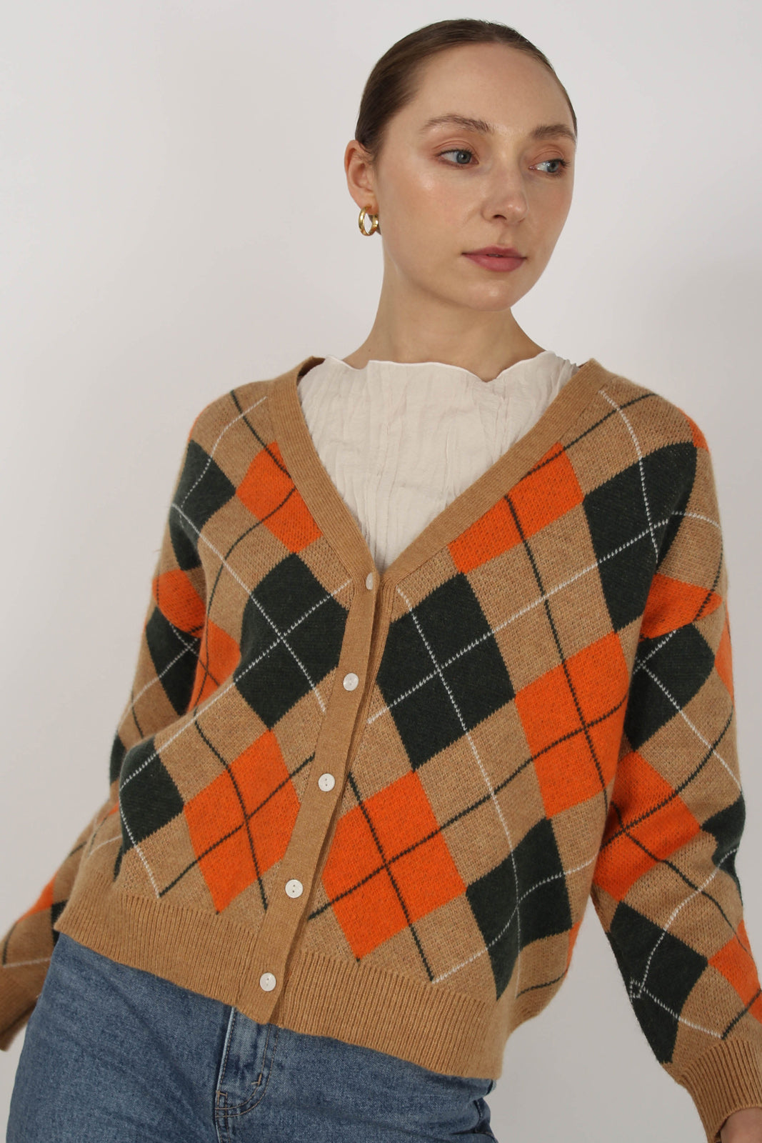 Beige and orange argyle V neck cardigan_1