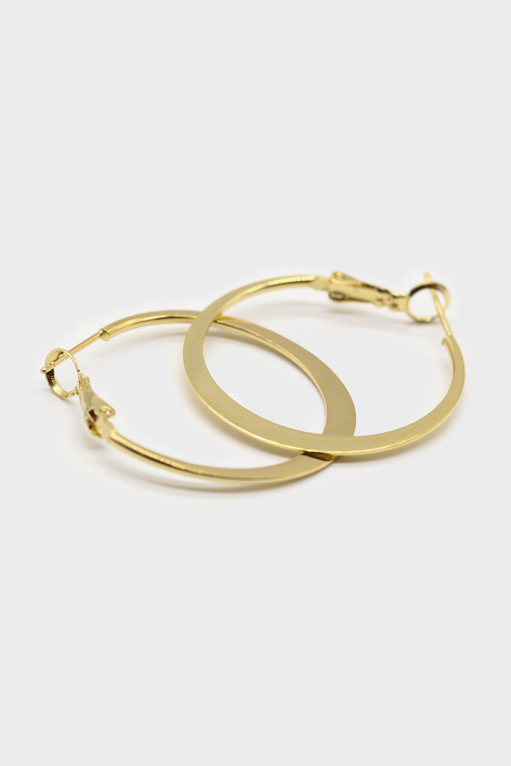 Gold medium smooth flat hoop earrings_1