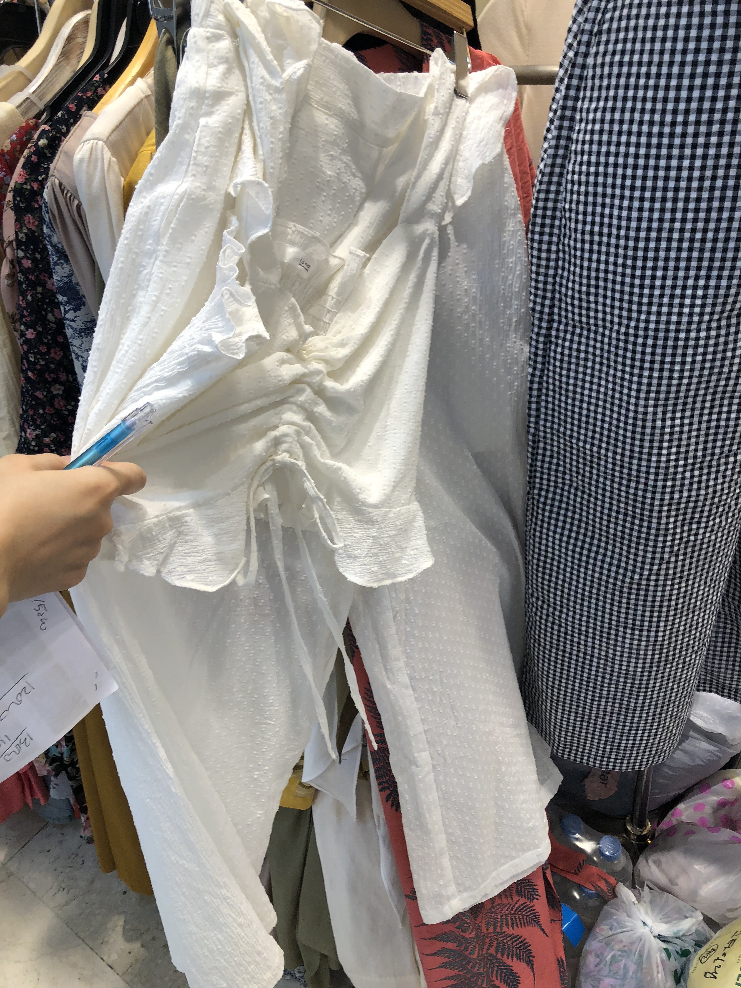 White textured loose fit trousers_1