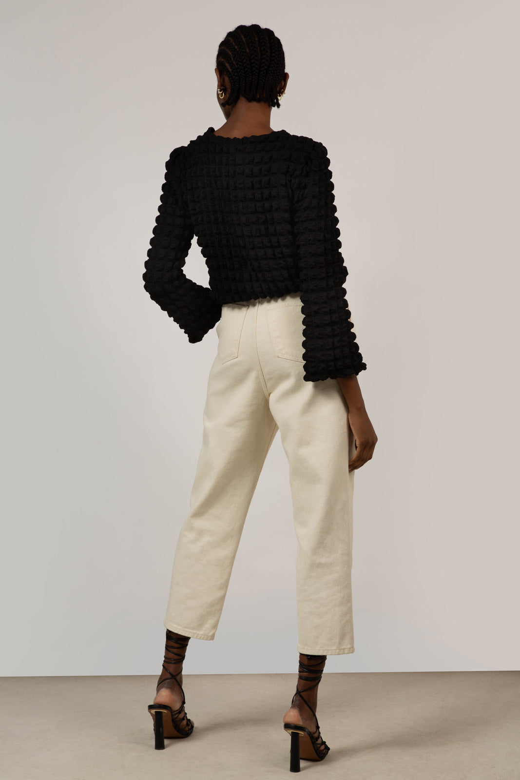 Black textured puff long sleeved top_5