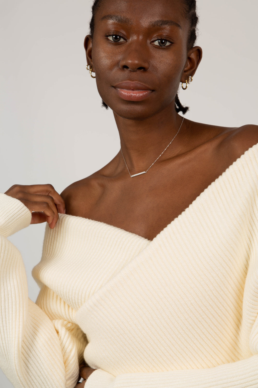 Ivory cross front panel knit top_2