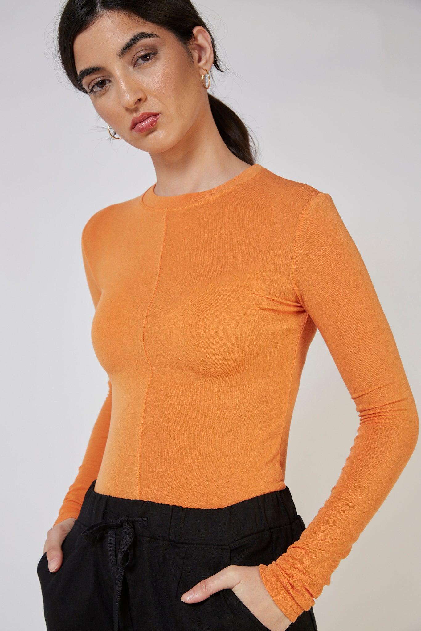 Bright orange fitted long sleeved top_1