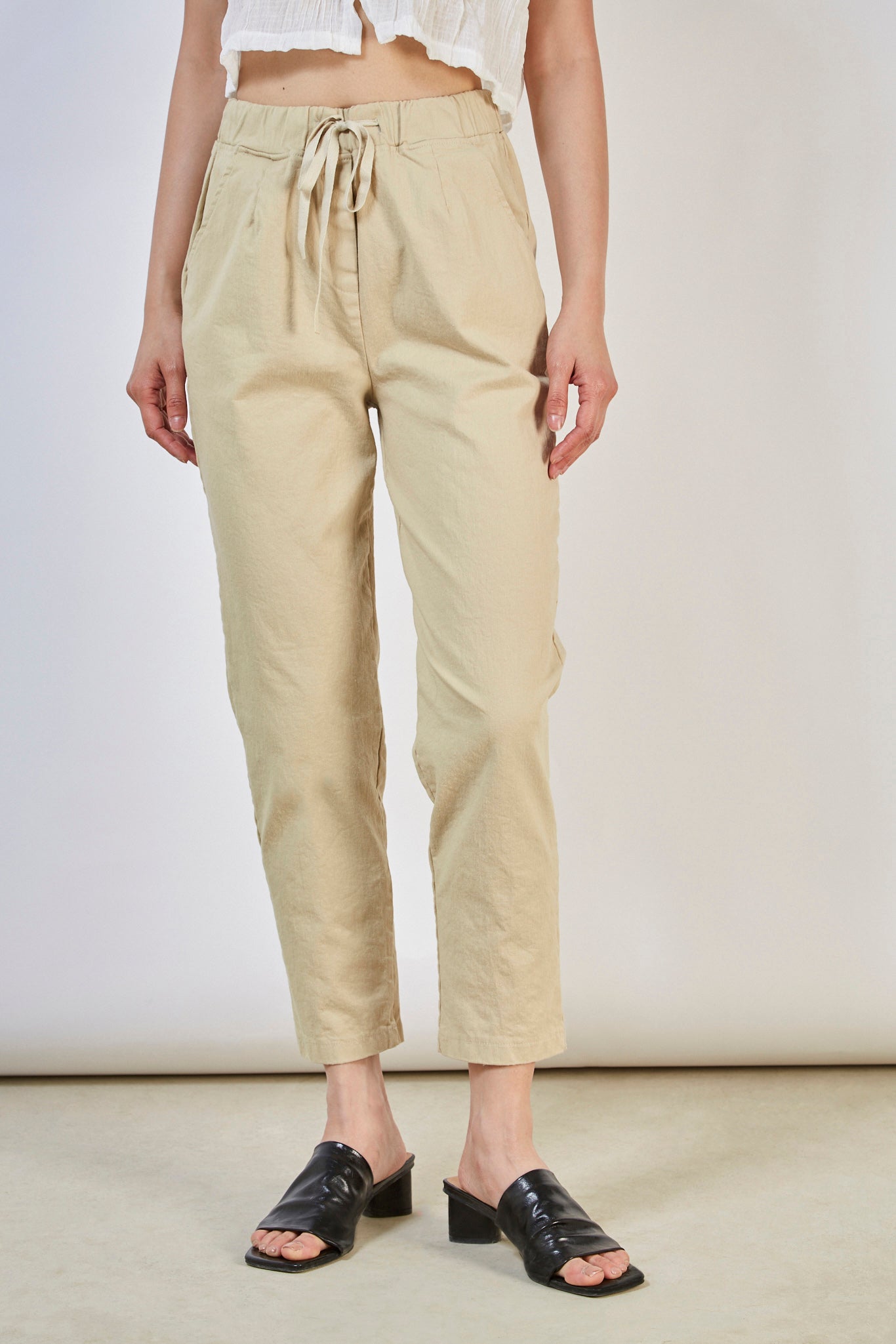 Beige loose fit drawstring trousers_1