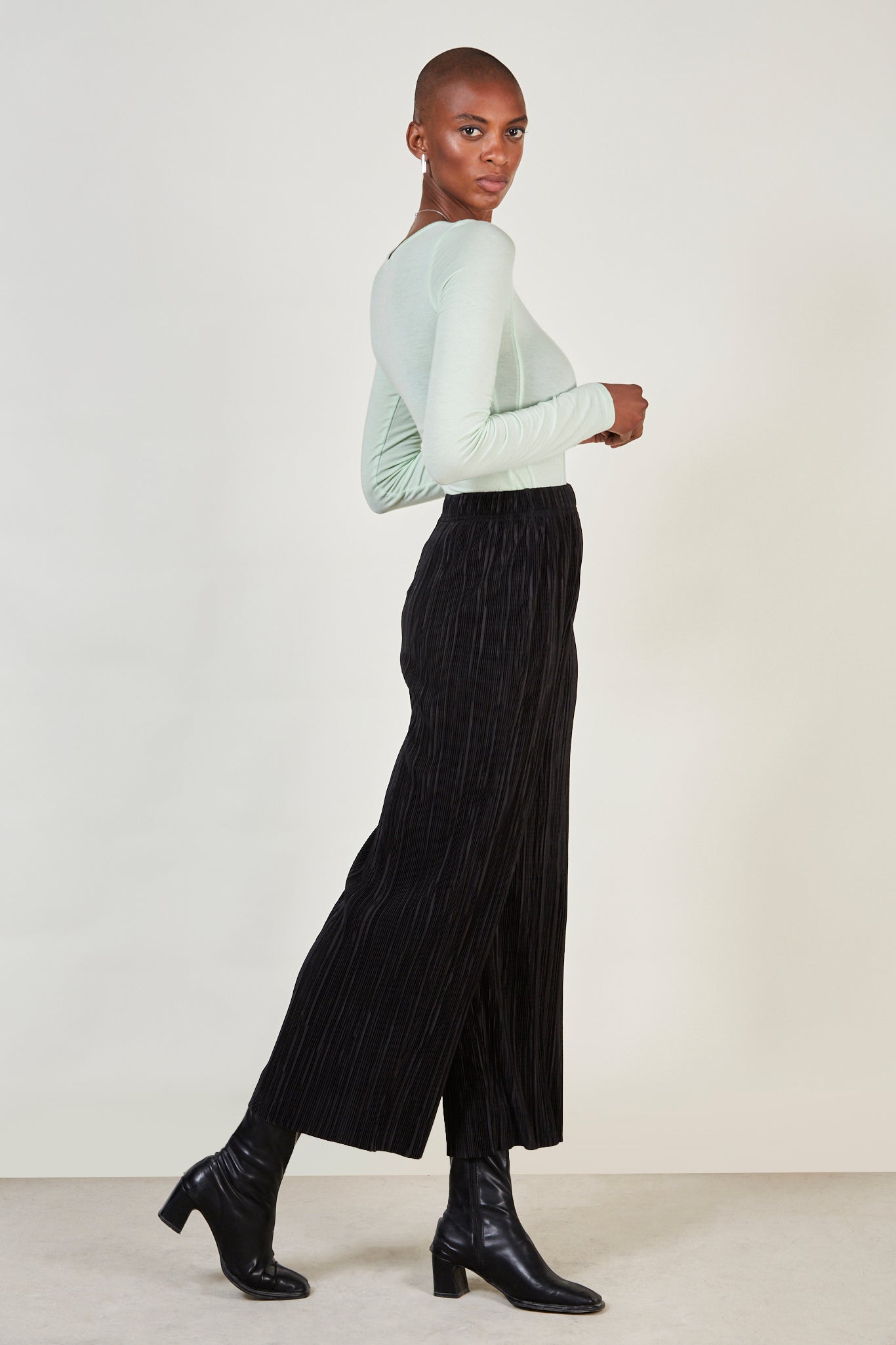 Black textured micro pleat trousers_1