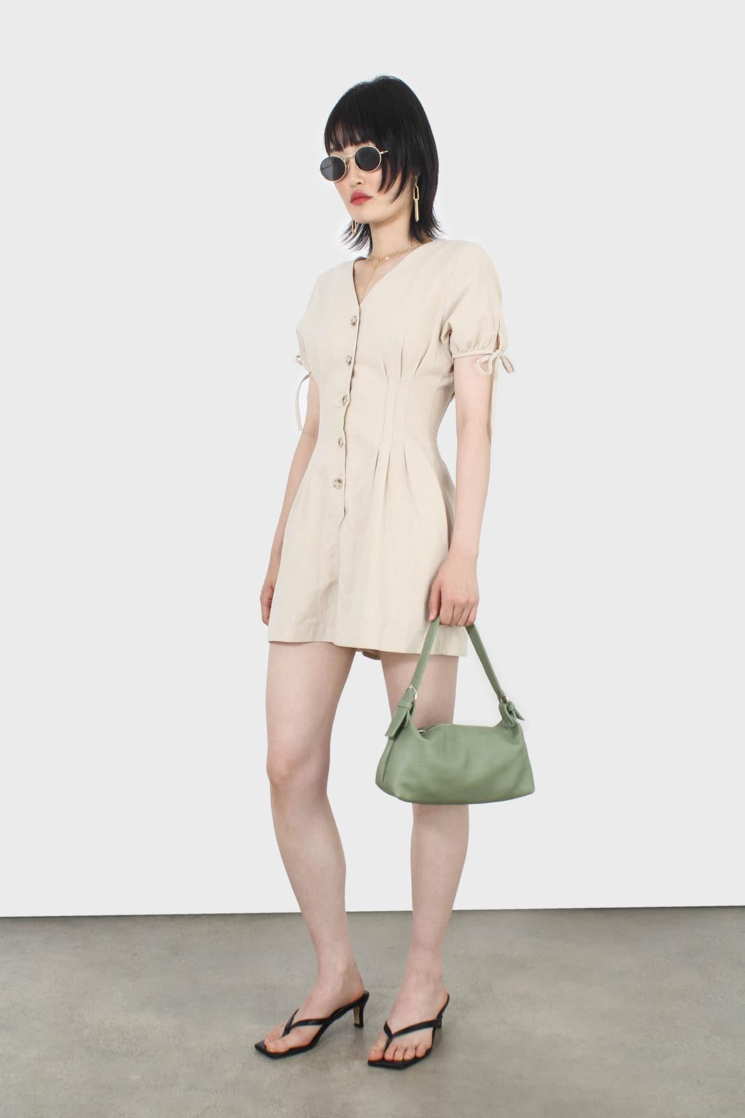 Beige V-neck tie sleeved linen romper_1