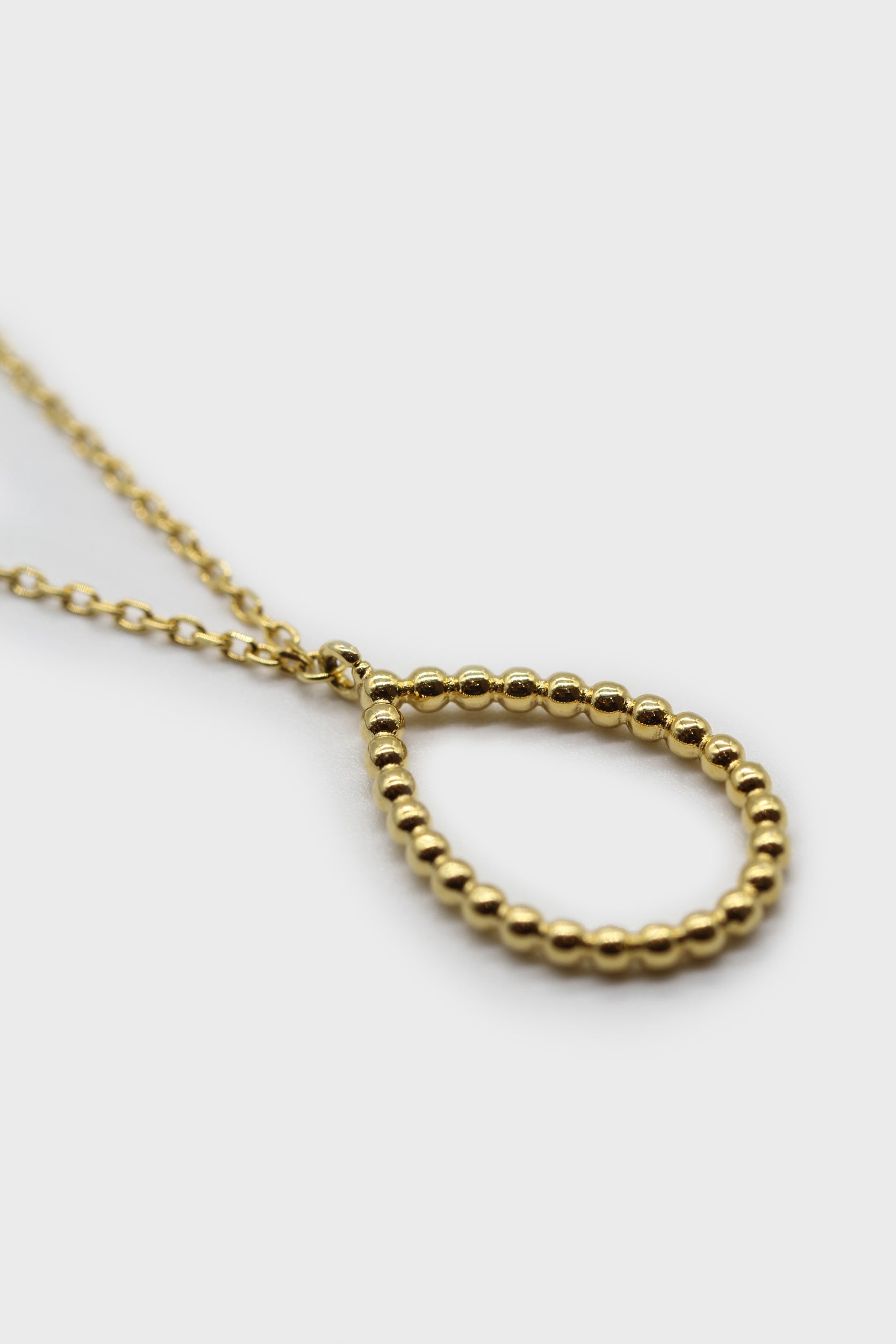 Charm necklace - Gold pinched oval bead pendant_1