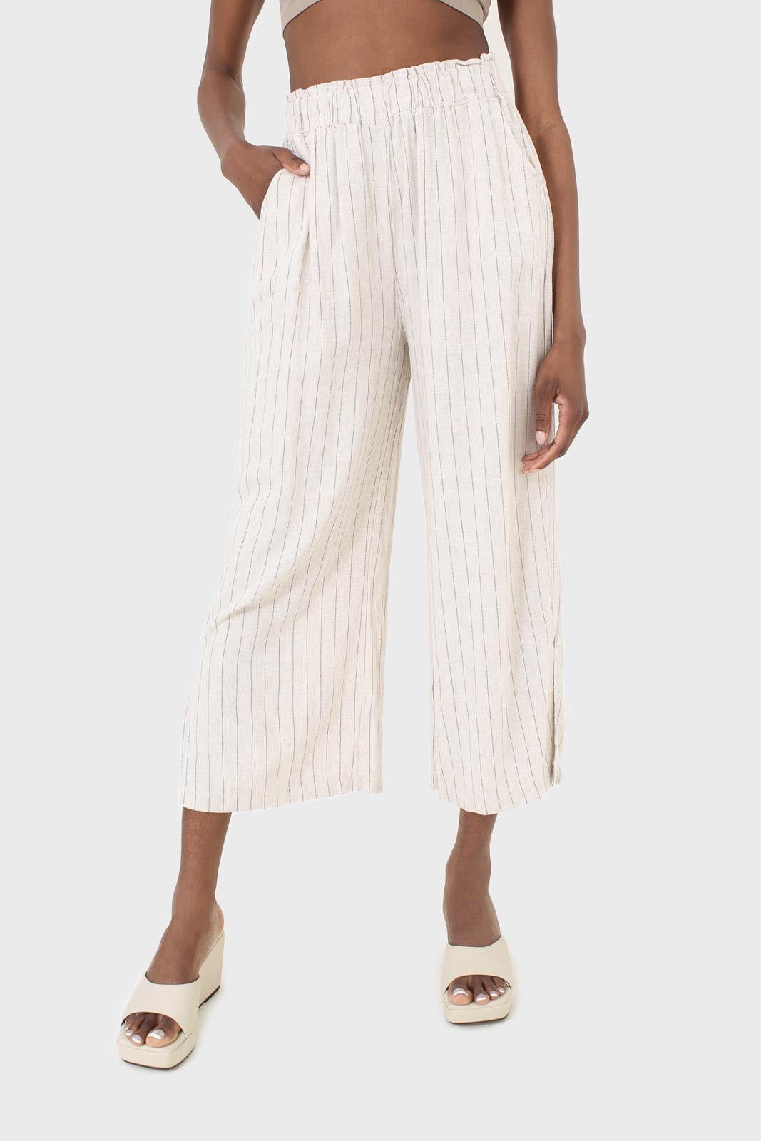 Pale beige pinstripe linen blend side slit trousers_1