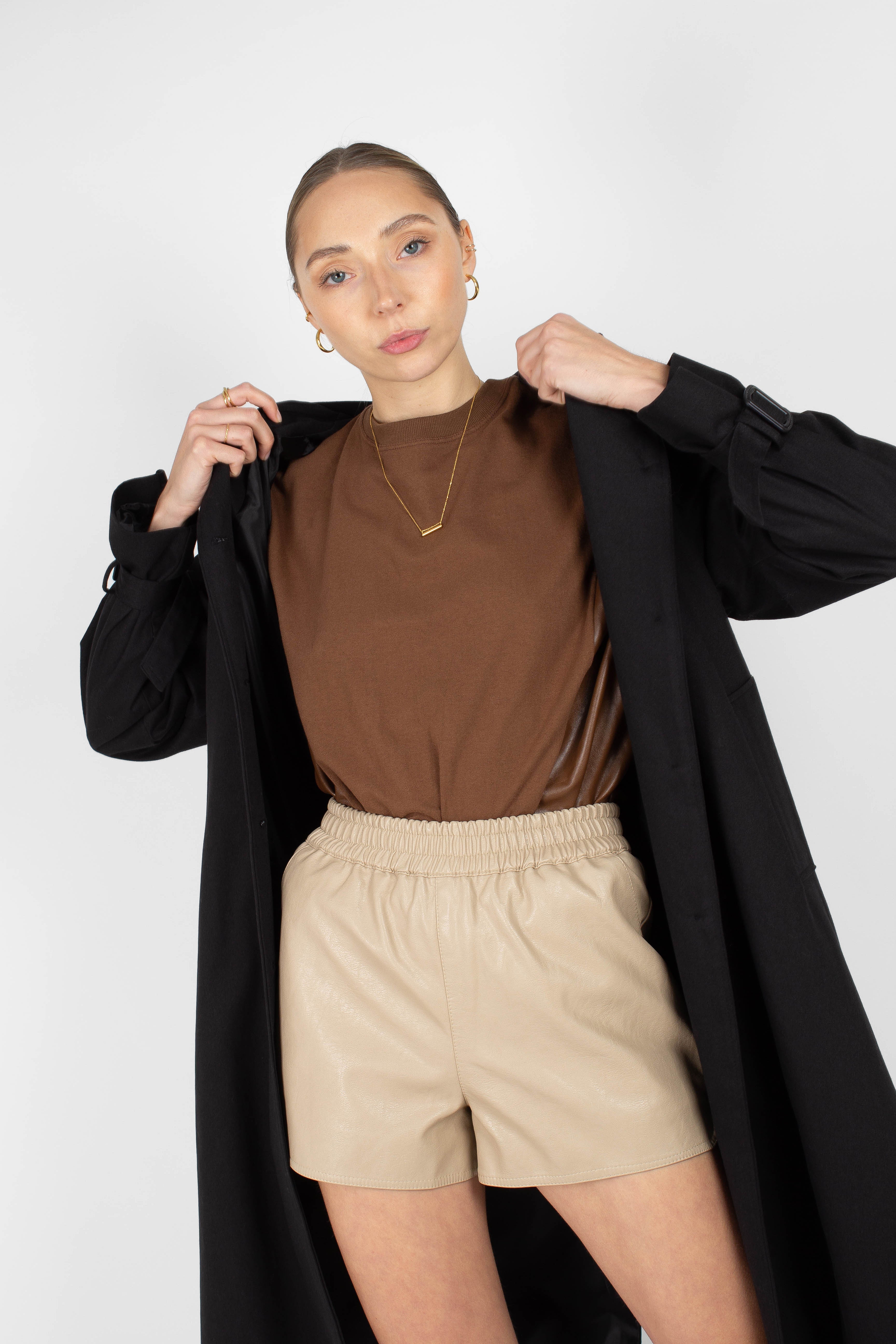 Beige vegan leather running shorts_3