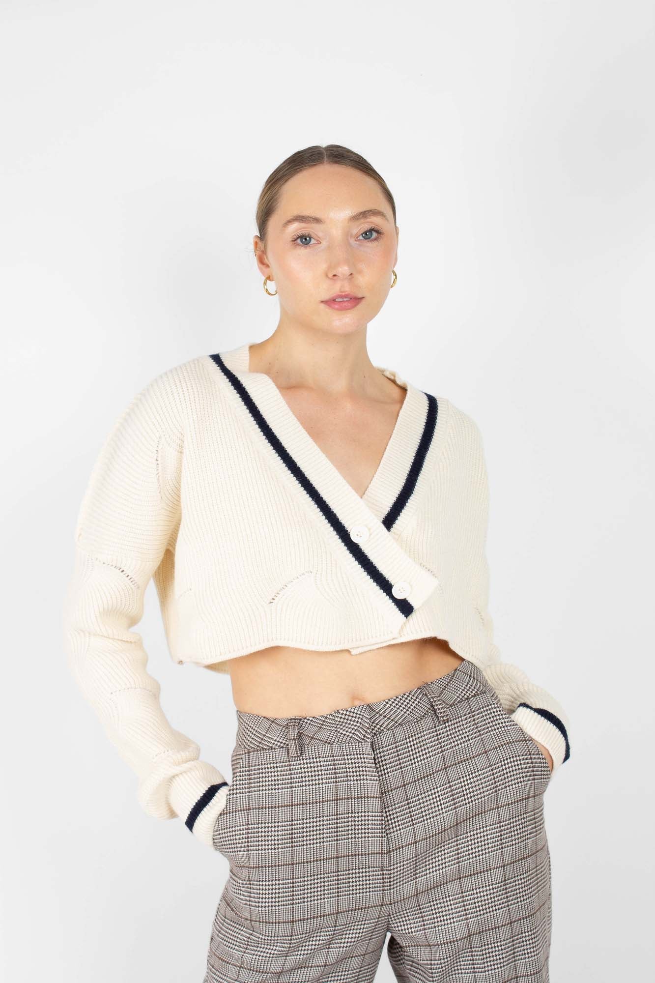 Ivory and black deep V cross front knit top_1