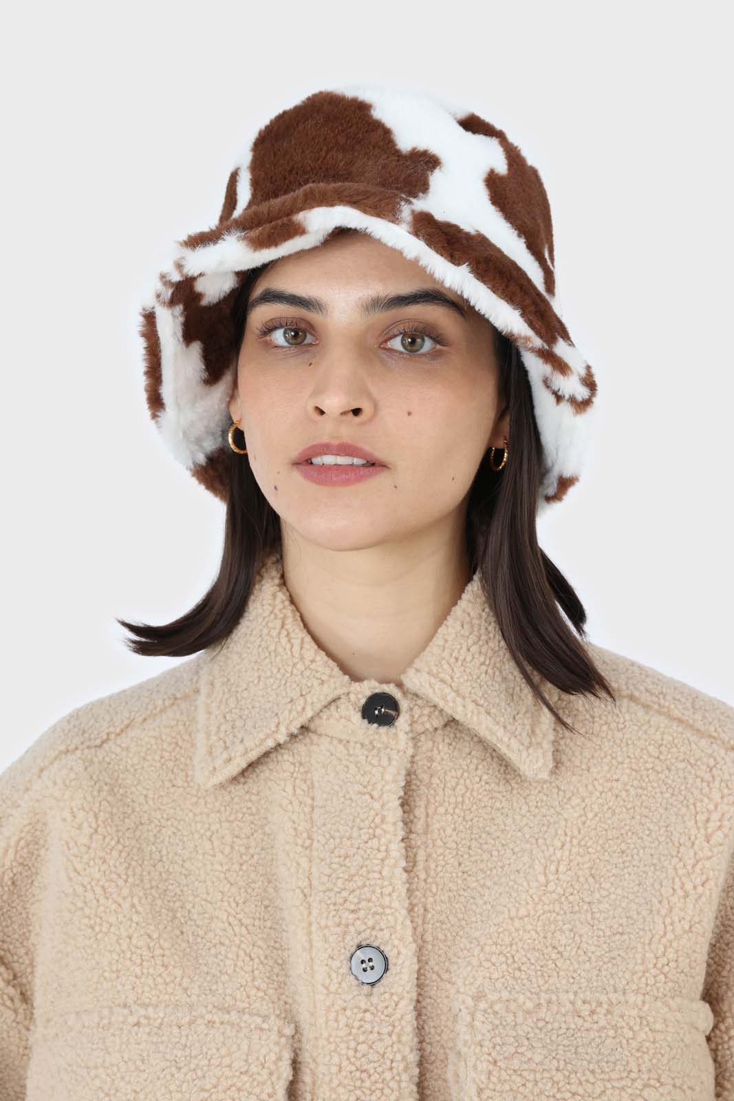 White and brown cow print faux fur bucket hat_1