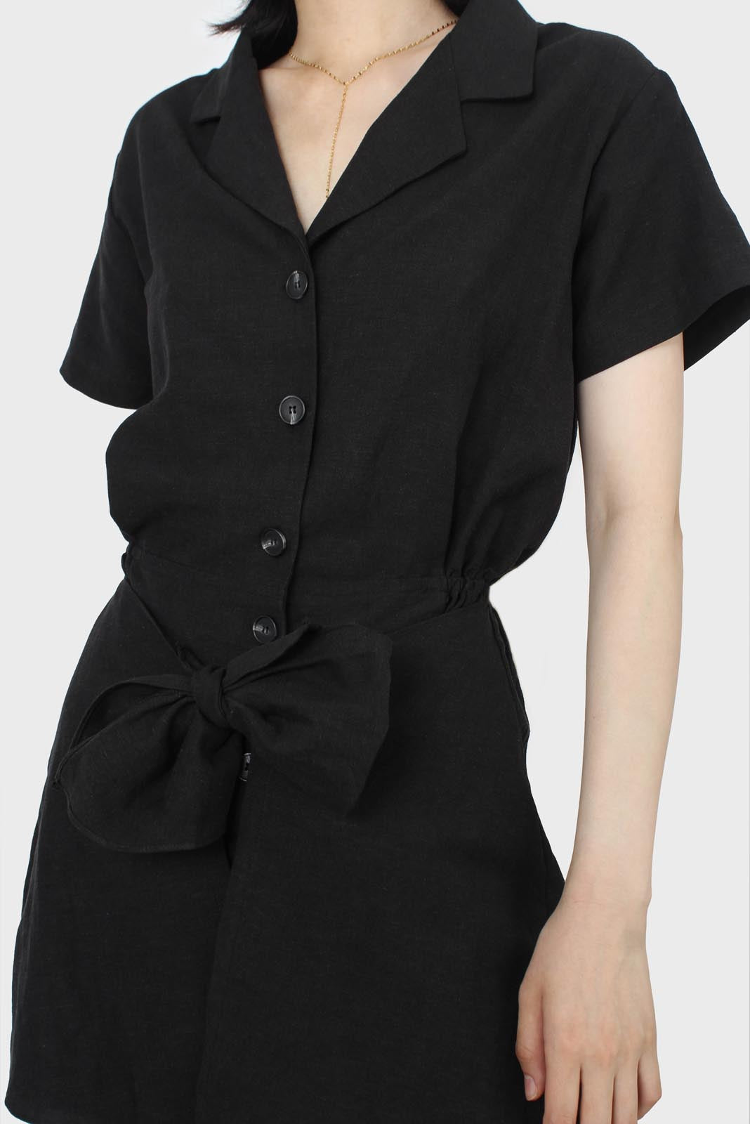 Black short sleeved button up tie waist romper_2