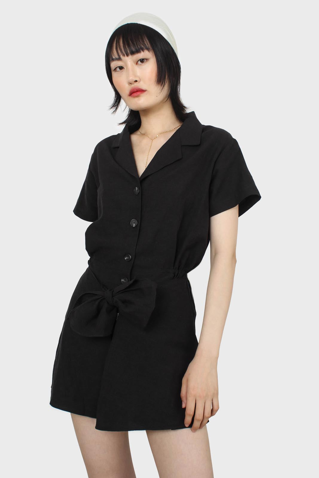 Black short sleeved button up tie waist romper_7