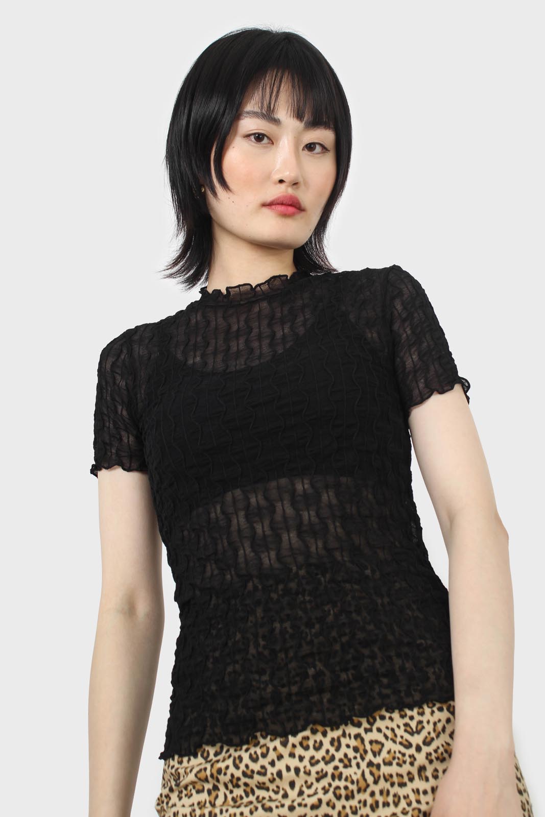 Black wave patterned semi sheer top_1