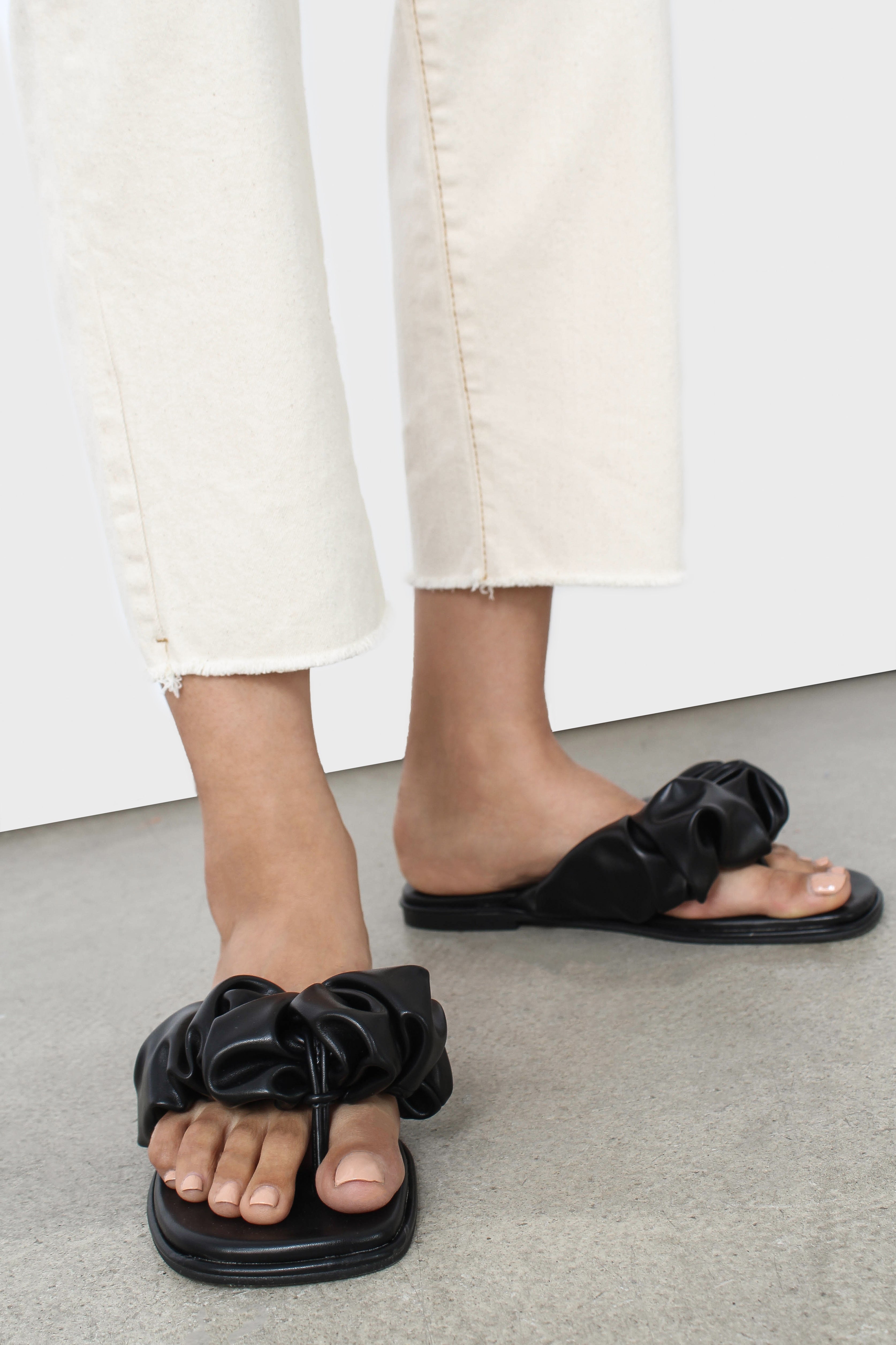 Black puffed vegan leather sliders_11