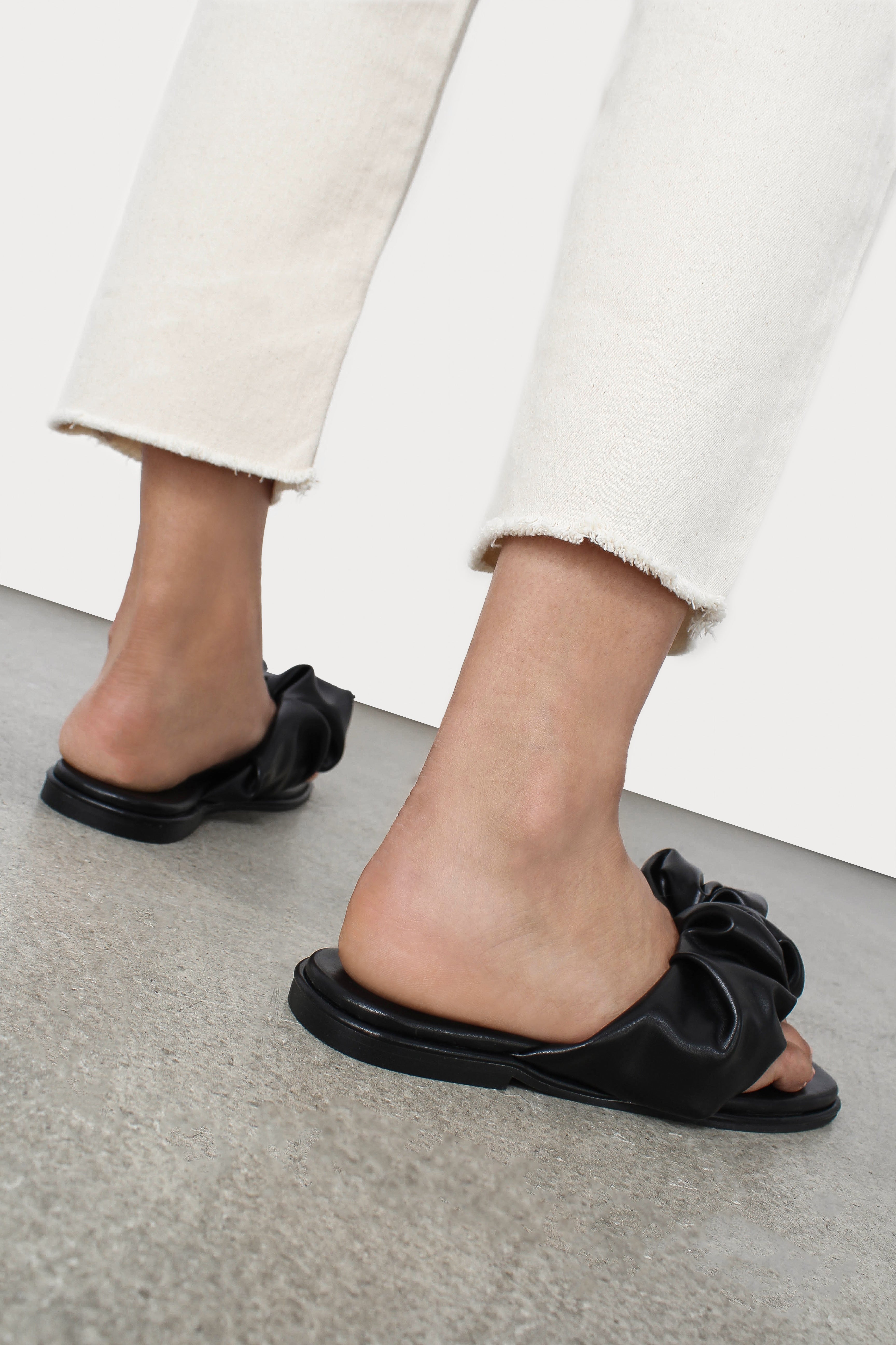 Black puffed vegan leather sliders_12