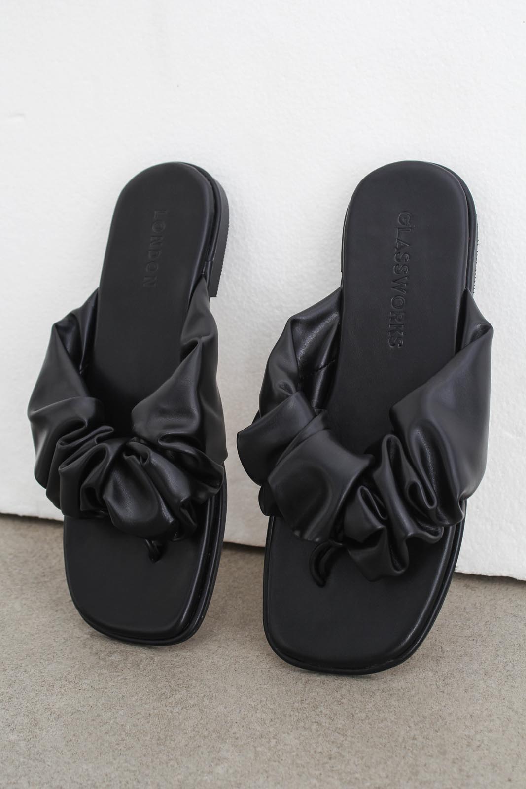 Black puffed vegan leather sliders_9