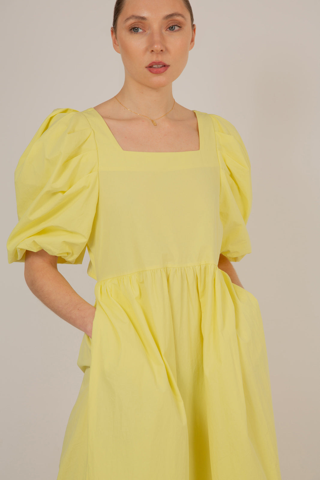 Yellow puff sleeve button back midi dress_8