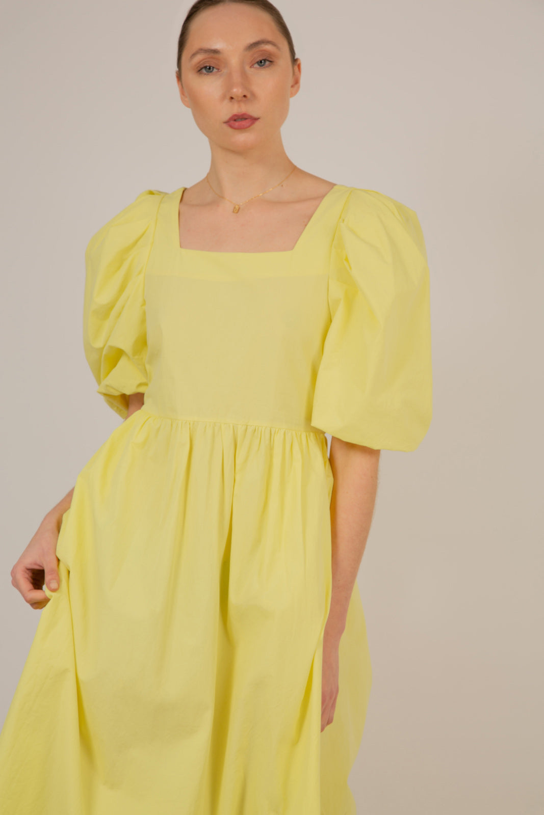 Yellow puff sleeve button back midi dress_4
