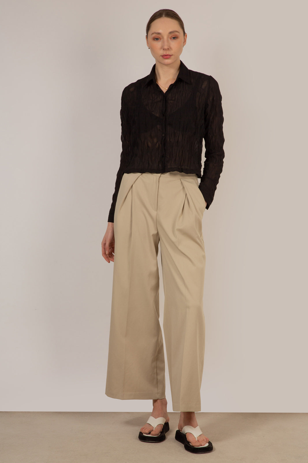 Beige side pleat wide leg trousers_1