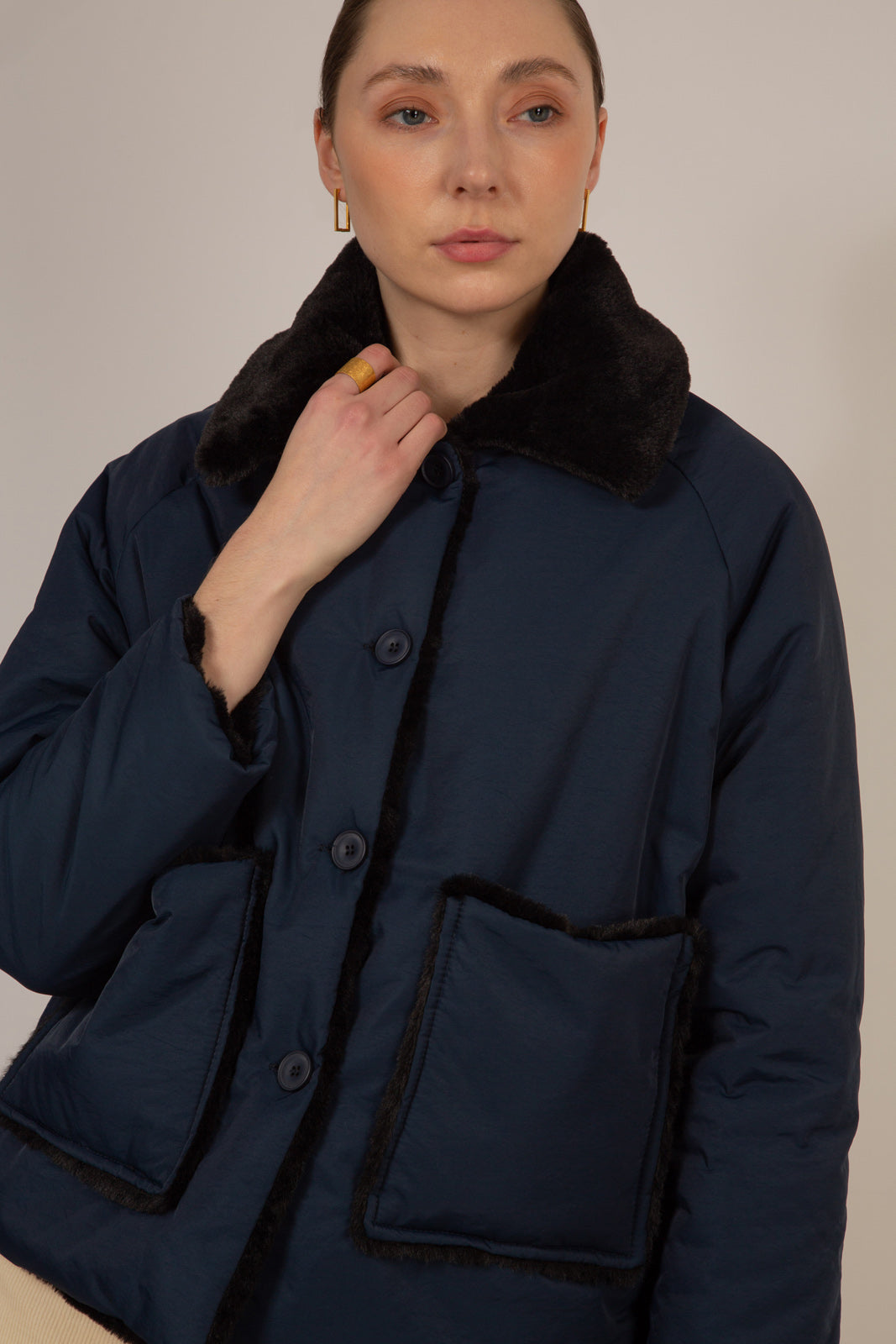 Navy faux fur large pocket reversible coat_1