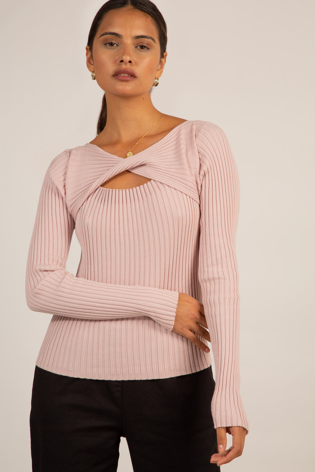Pink peek twist front knit top