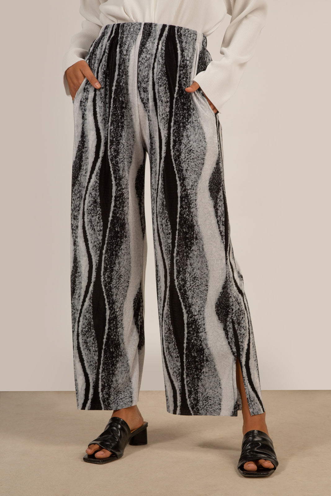 Grey and black abstract print trousers_1