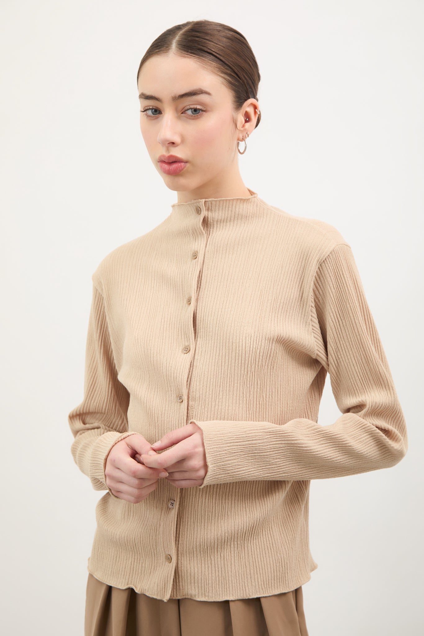 Beige textured button up mock neck top_1