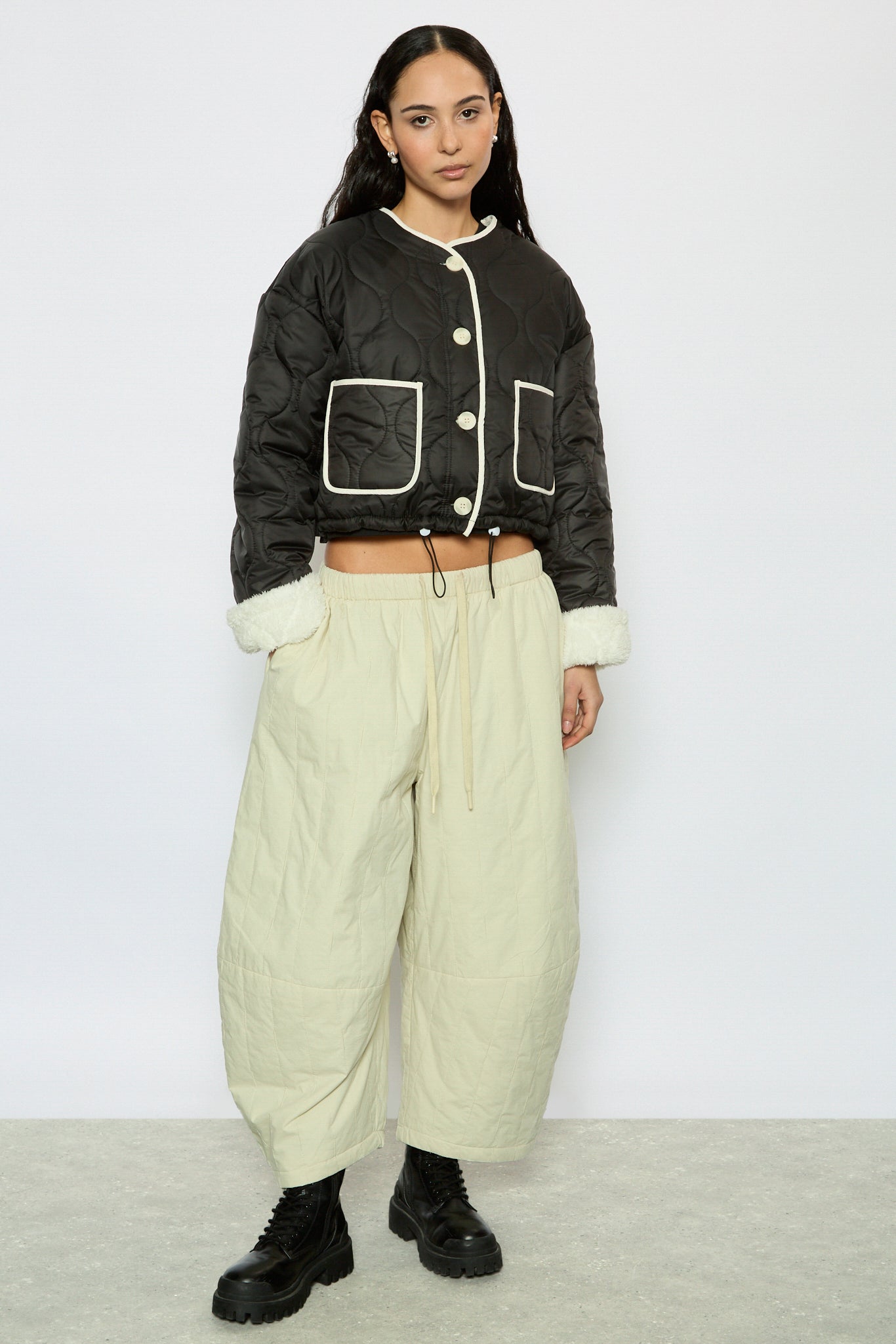 Black and ivory fuzzy lined circle quilted jacket_4