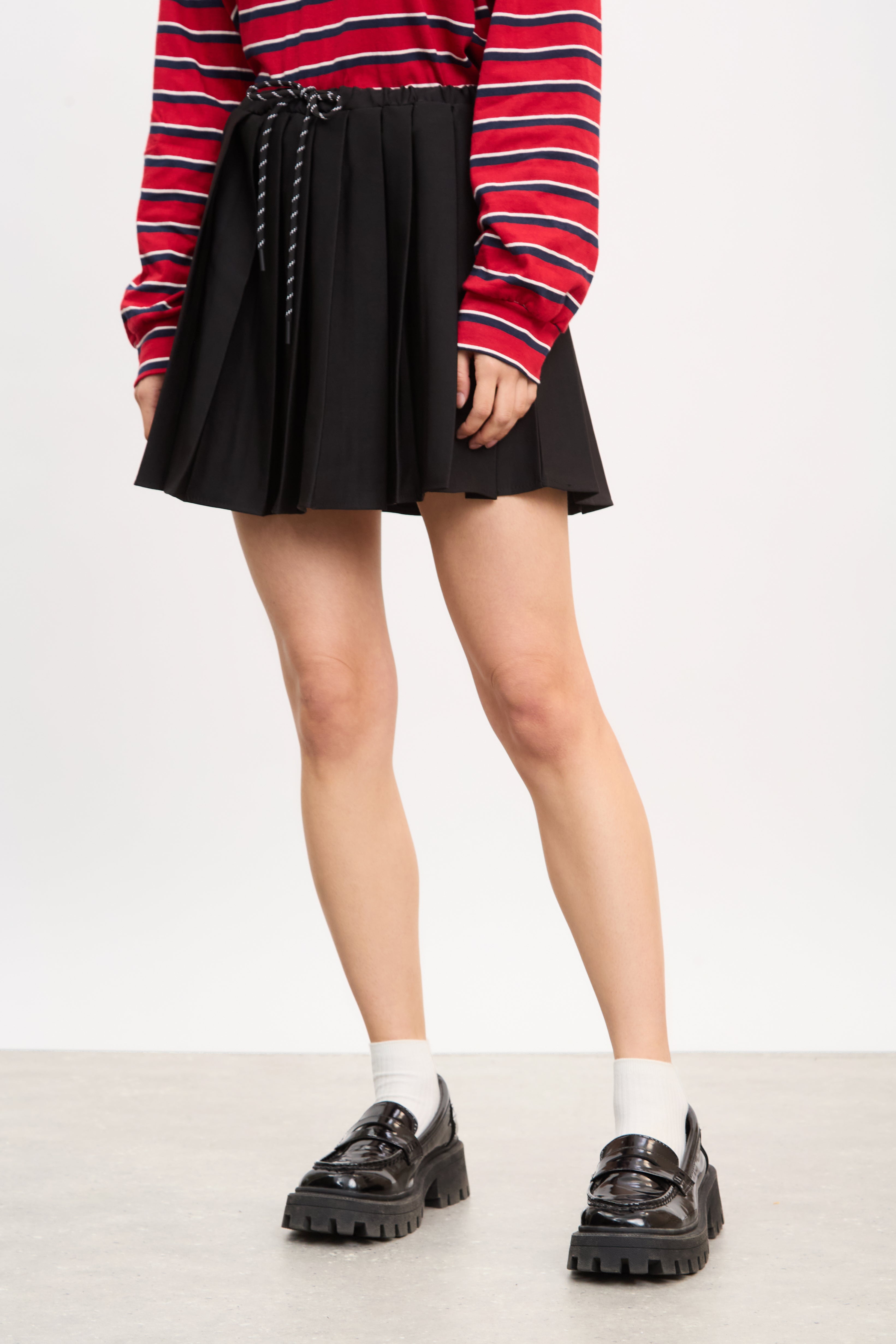 Black pleated contrast drawstring mini skirt_1