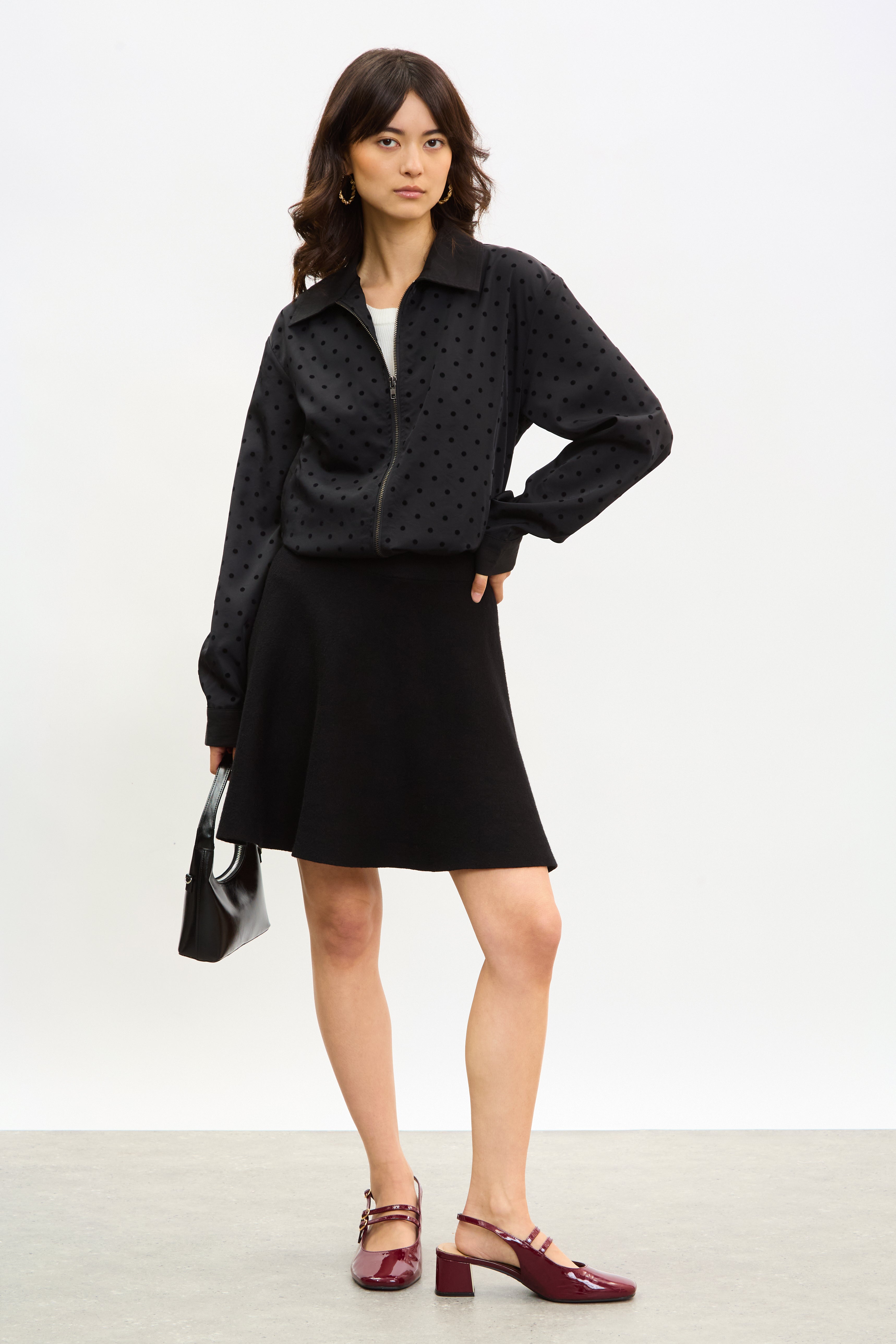 Black smooth shaped knit mini skirt_3