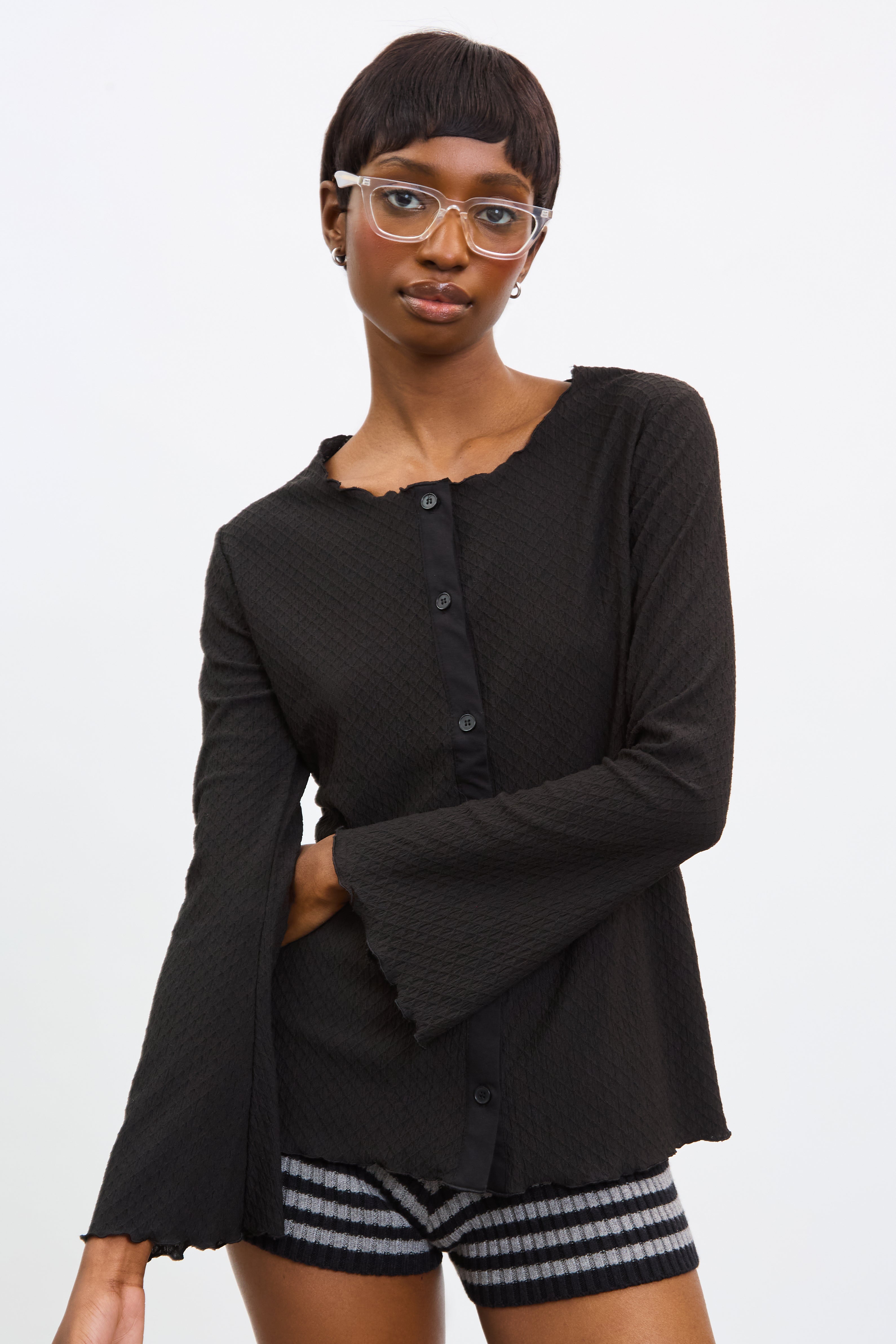 Black textured round neck button front top_1