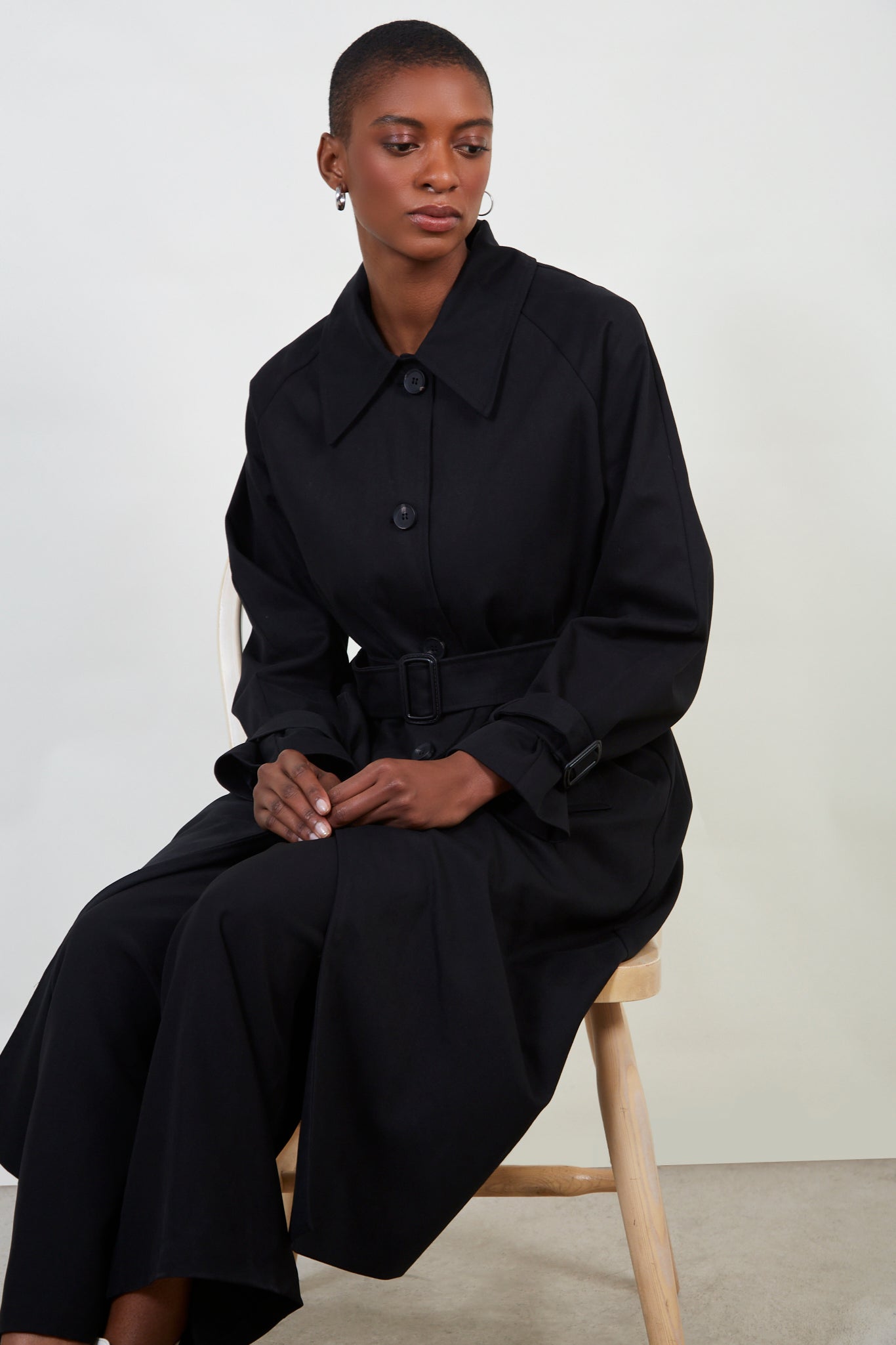 Black single breasted buckle detail trench coat_9