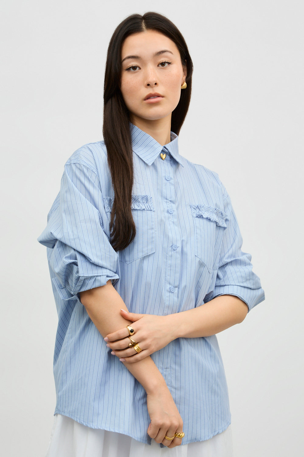 Blue striped ruffle pocket trim shirt_1