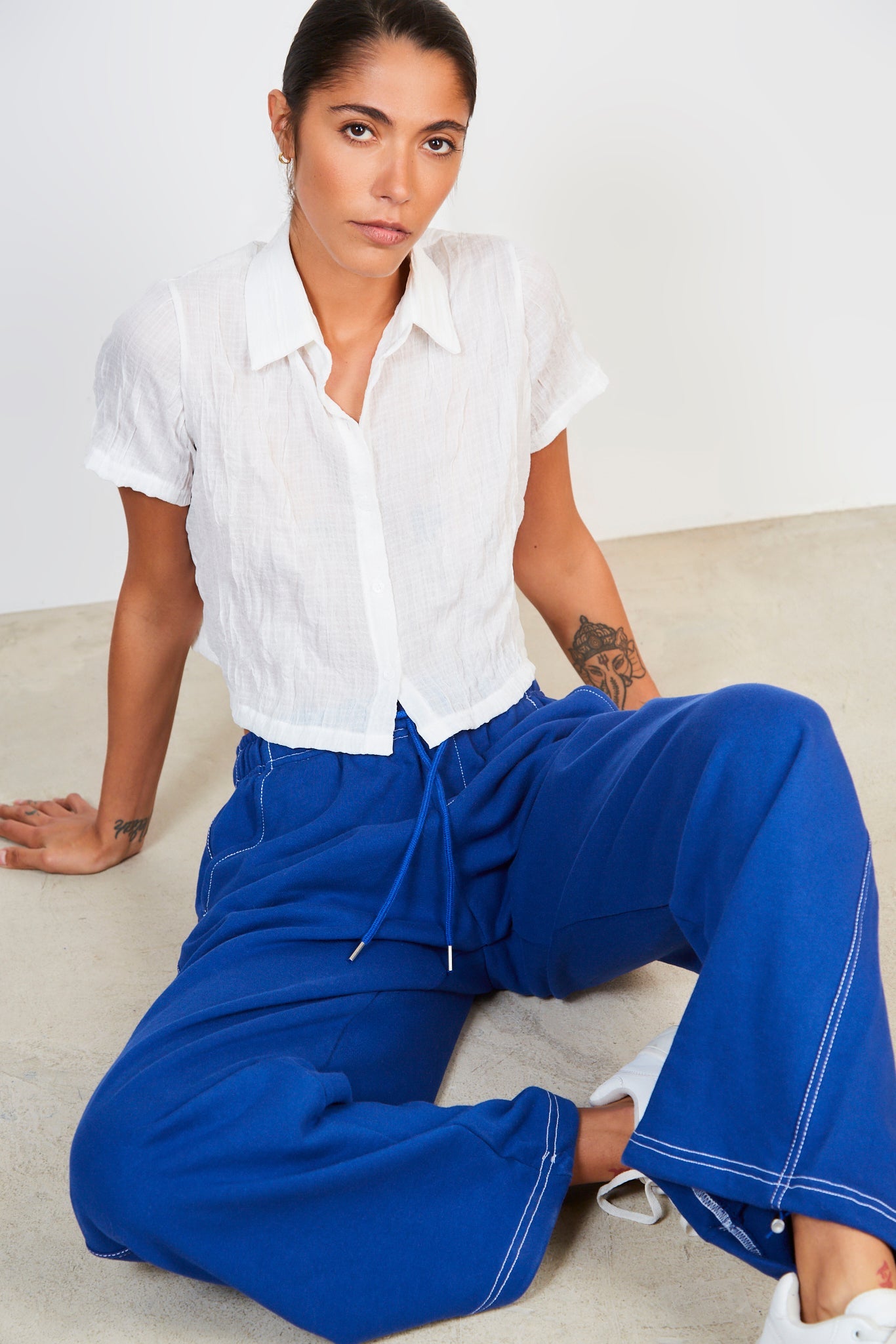 Blue and white contrast stitch sweatpants