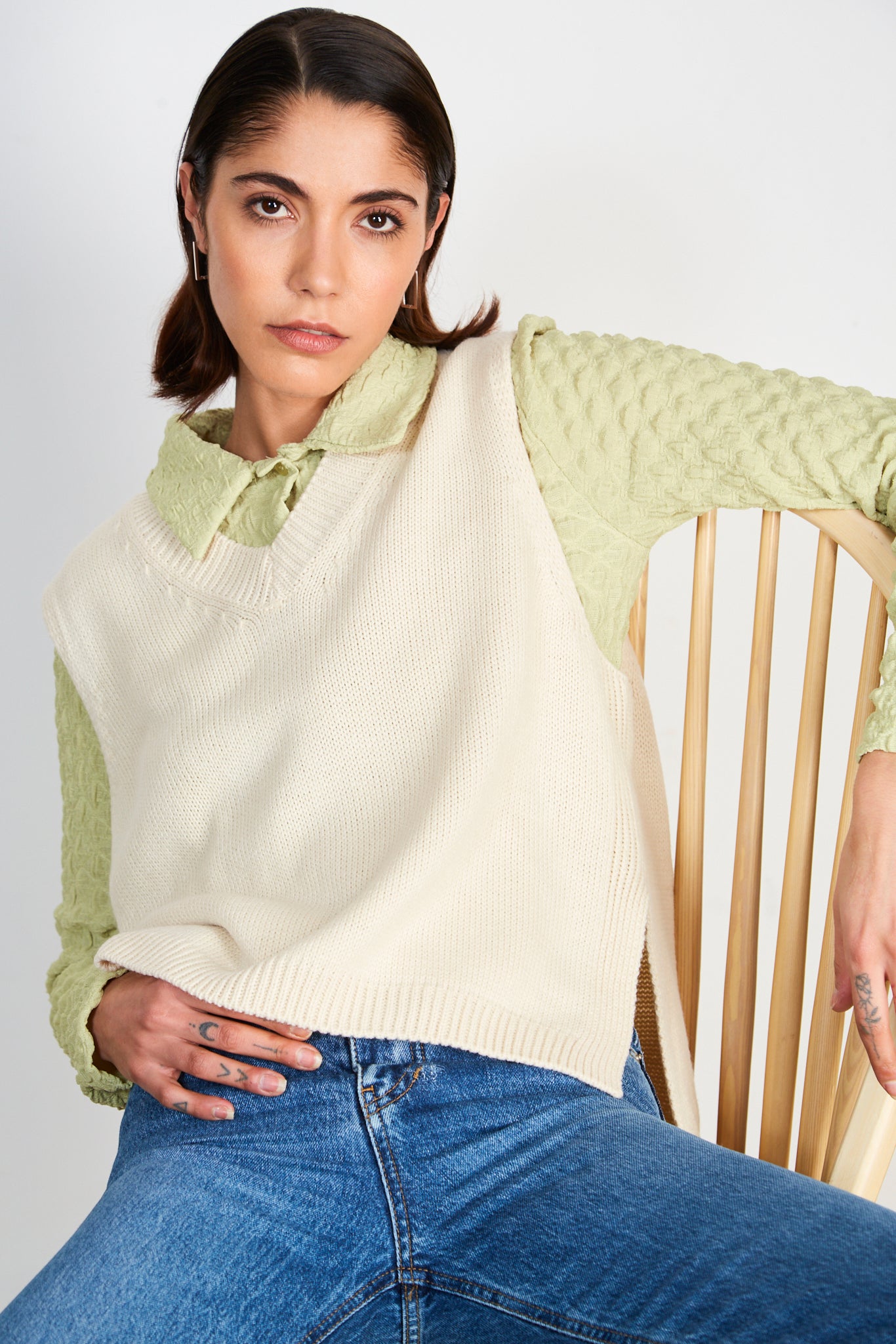 Cream V neck sweater vest_1