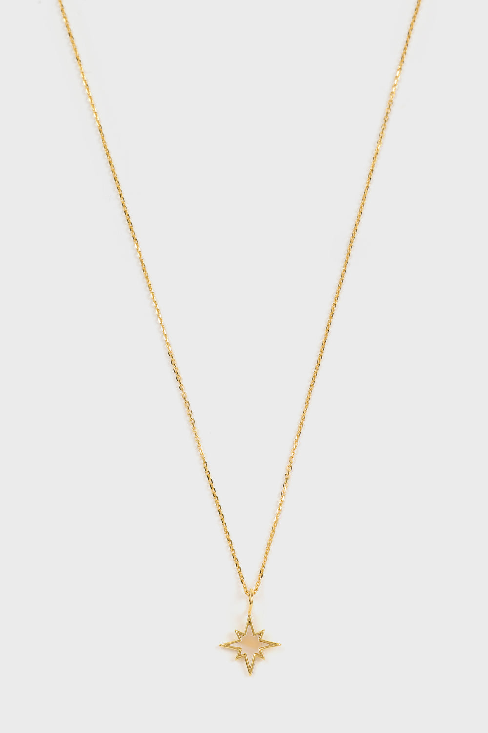 Gold opalescent star burst charm necklace_1