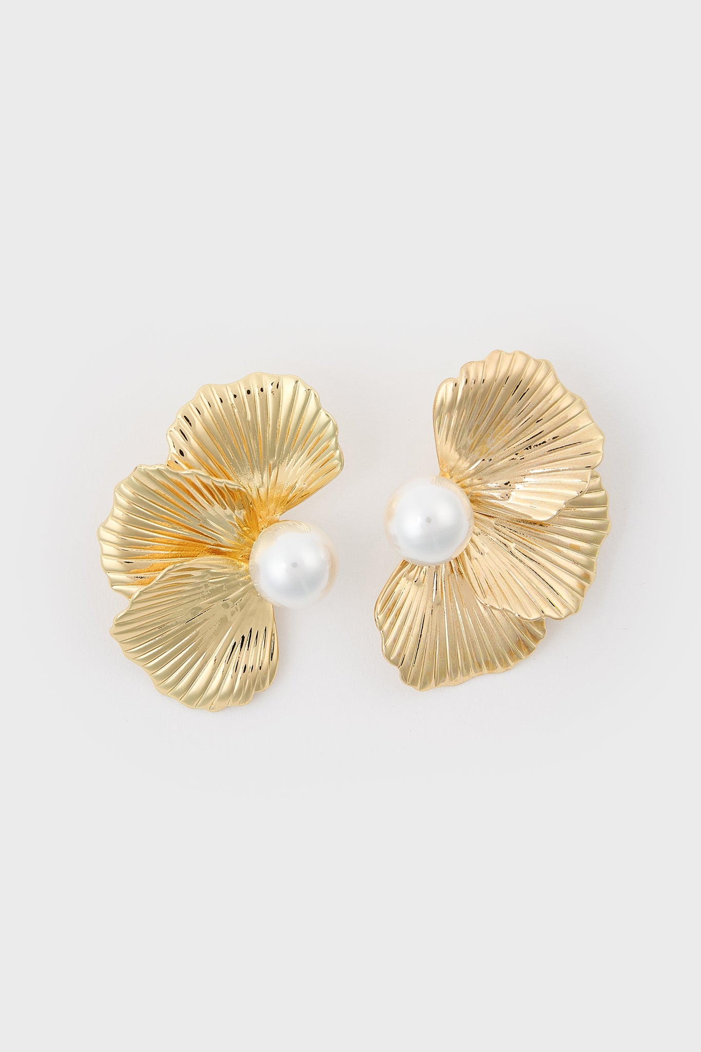 Gold single pearl half flower earrings_1