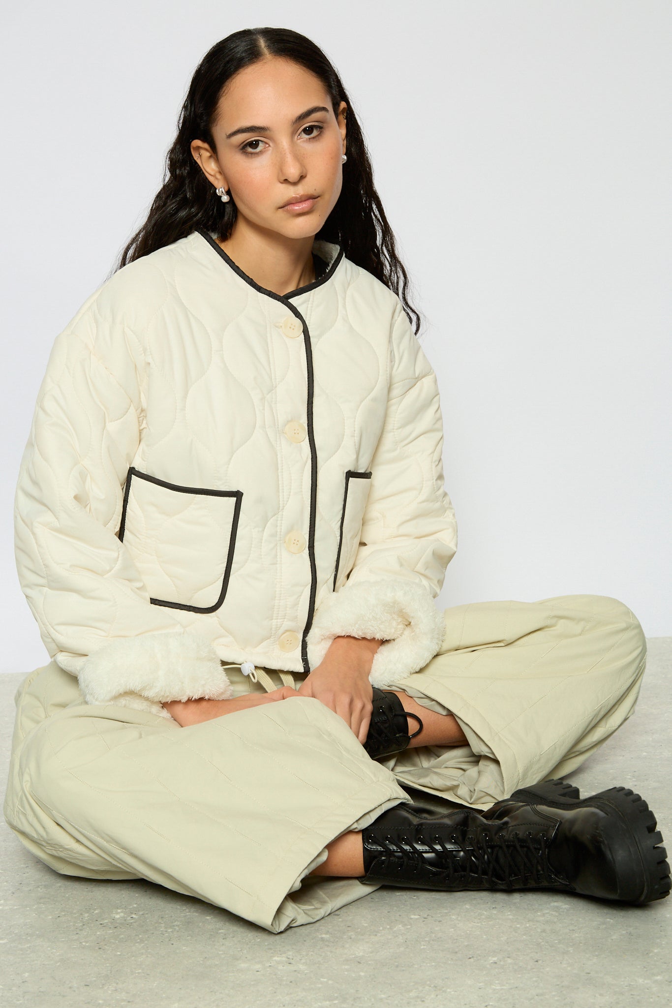 Ivory and black fuzzy lined circle quilted jacket_1