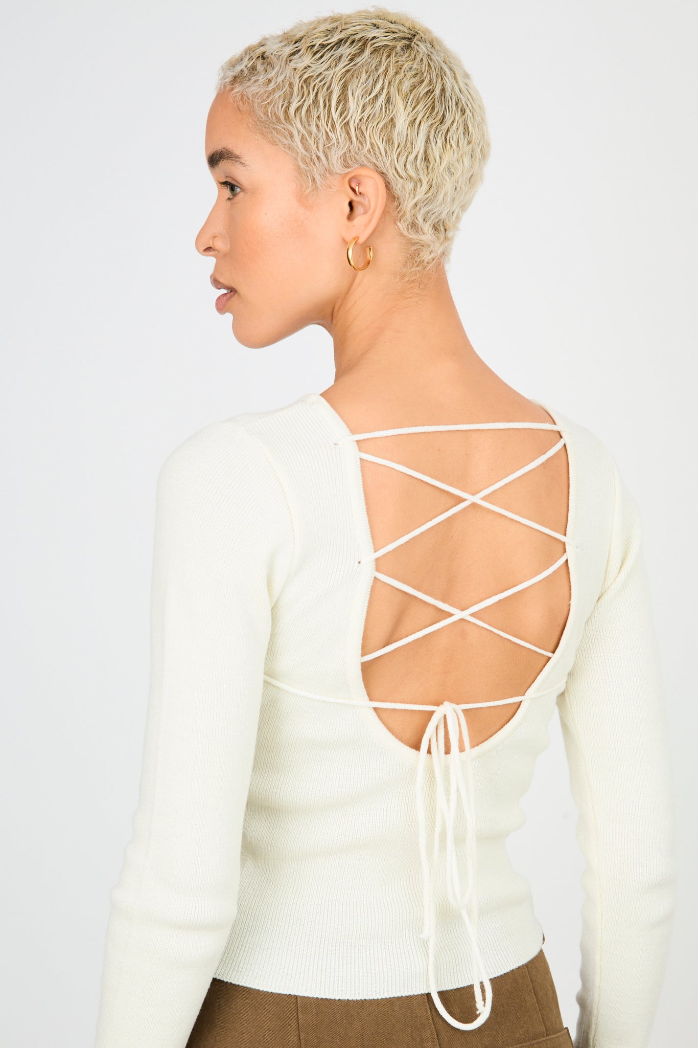 Ivory criss cross tie back knit top_1