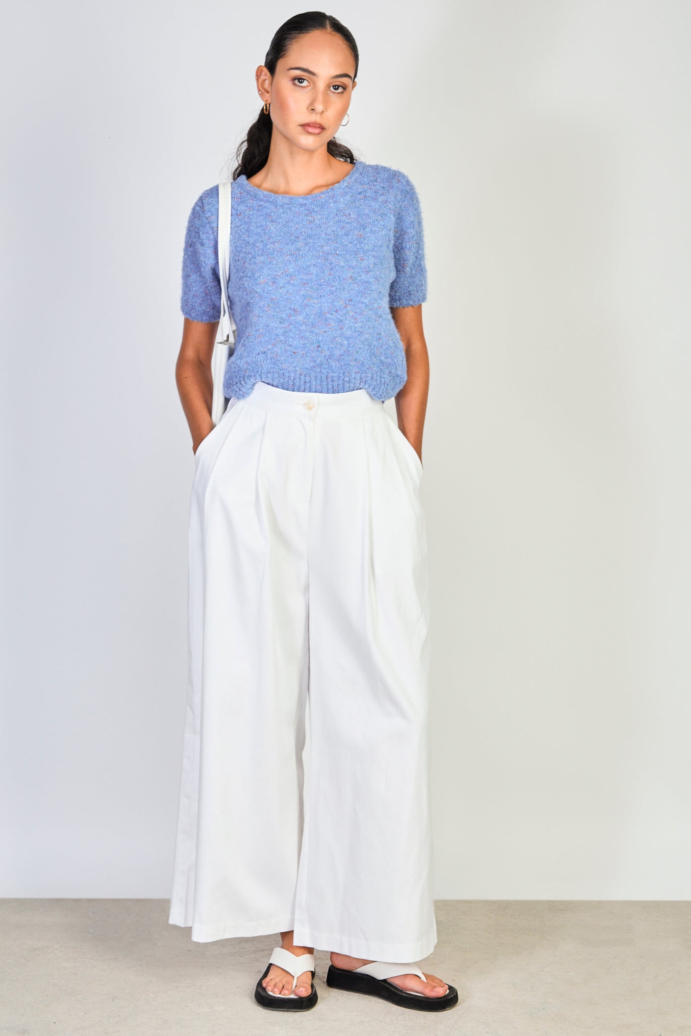 Ivory pleated wide leg trousers_4