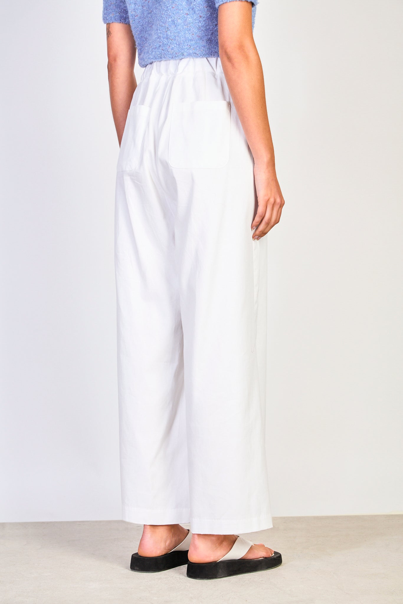 Ivory pleated wide leg trousers_2