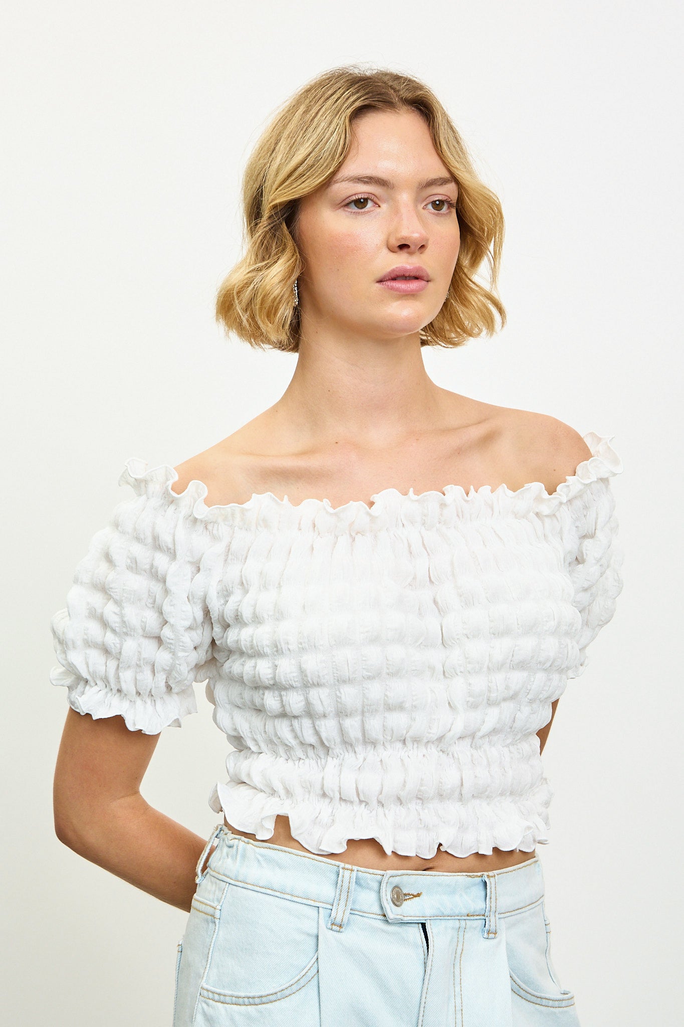 Ivory textured puff off shoulder top_1
