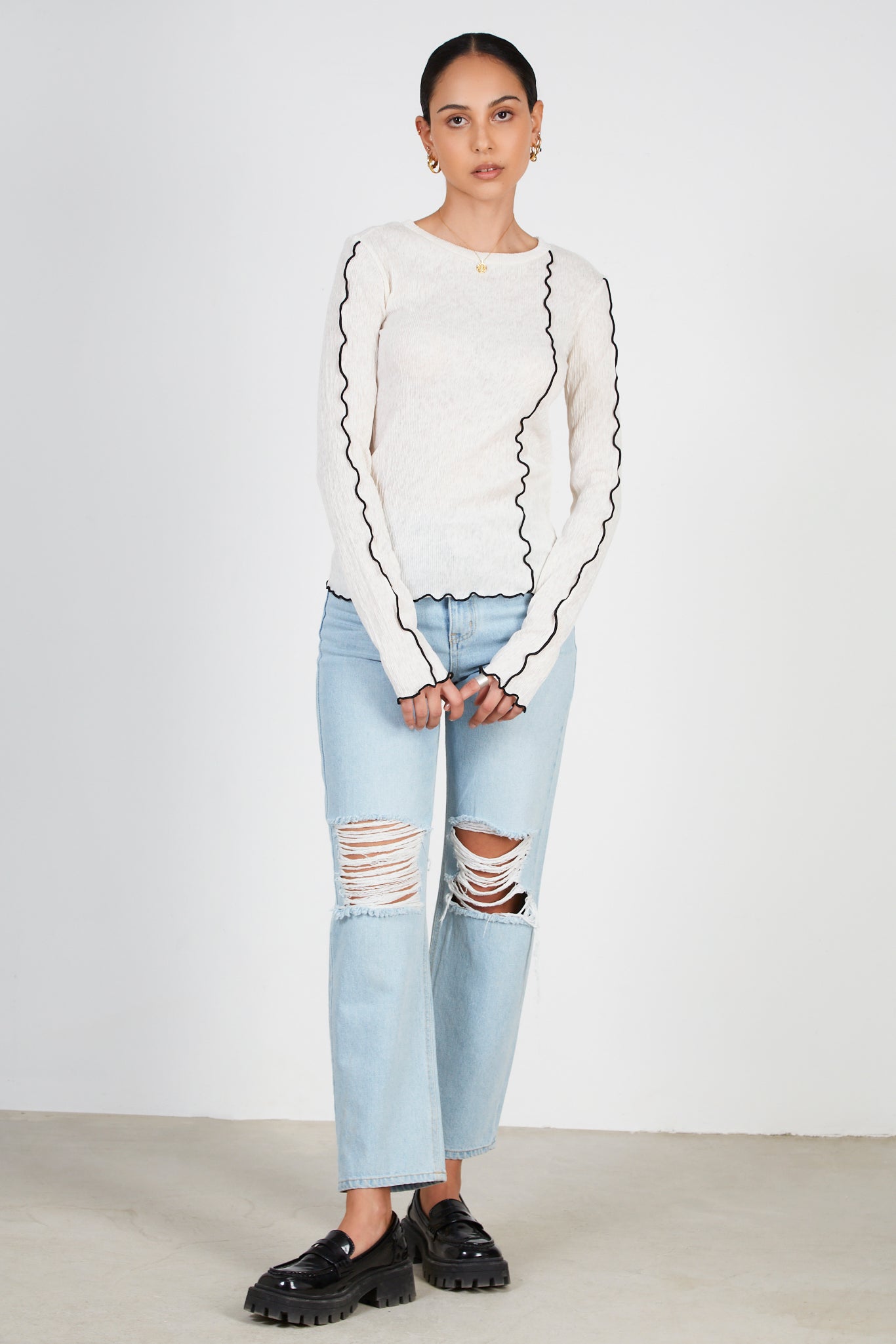 Ivory ribbed black trim top_3