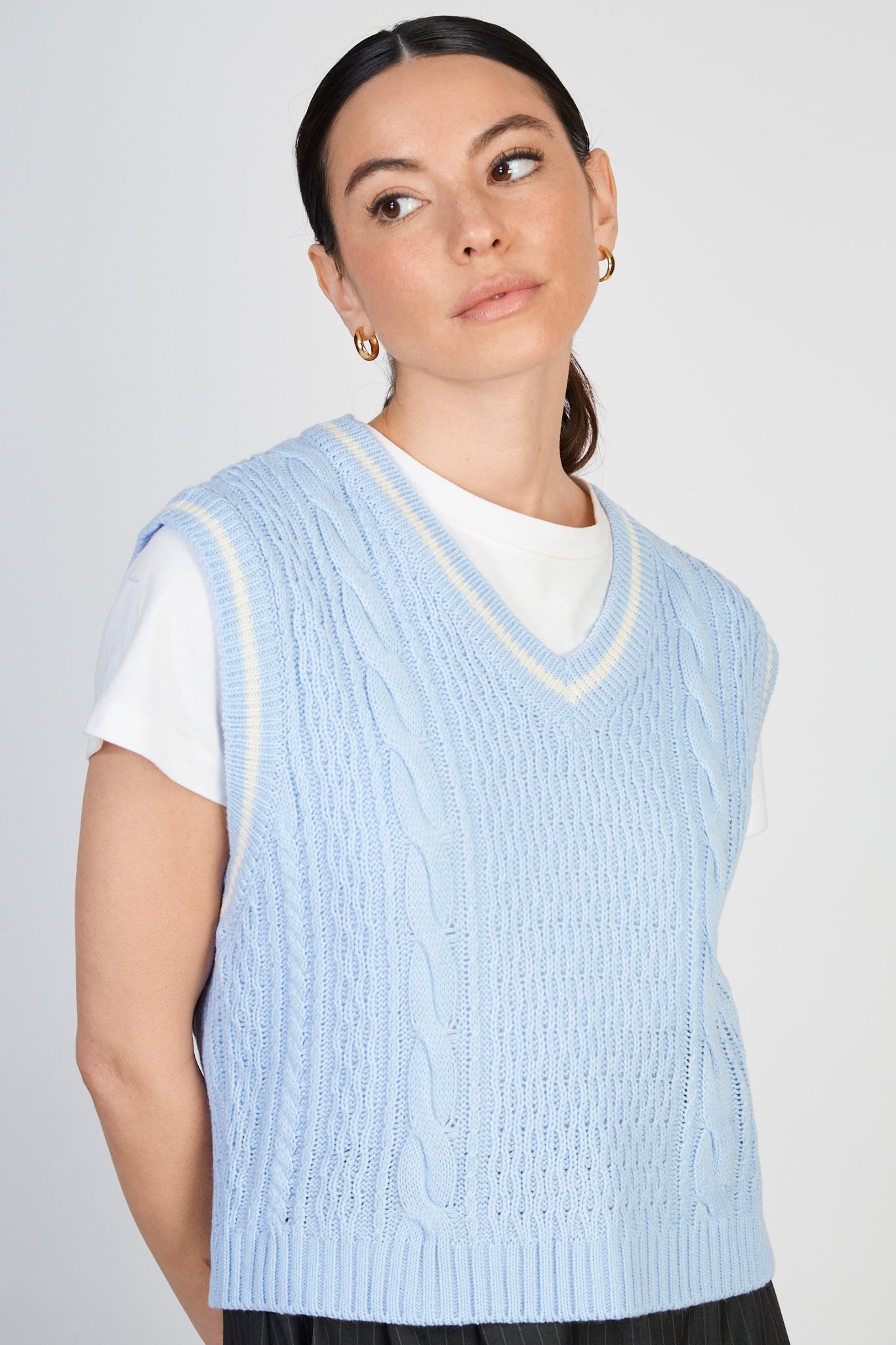 Light blue and ivory varsity trim sweater vest