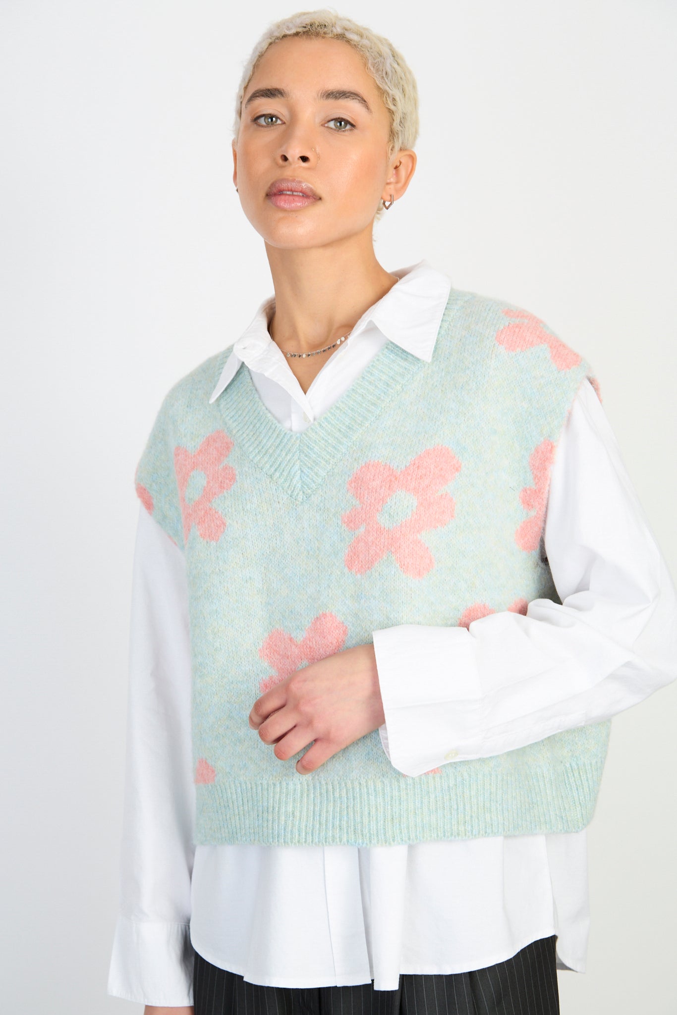 Light blue and pink graphic floral wool alpaca blend sweater vest_1