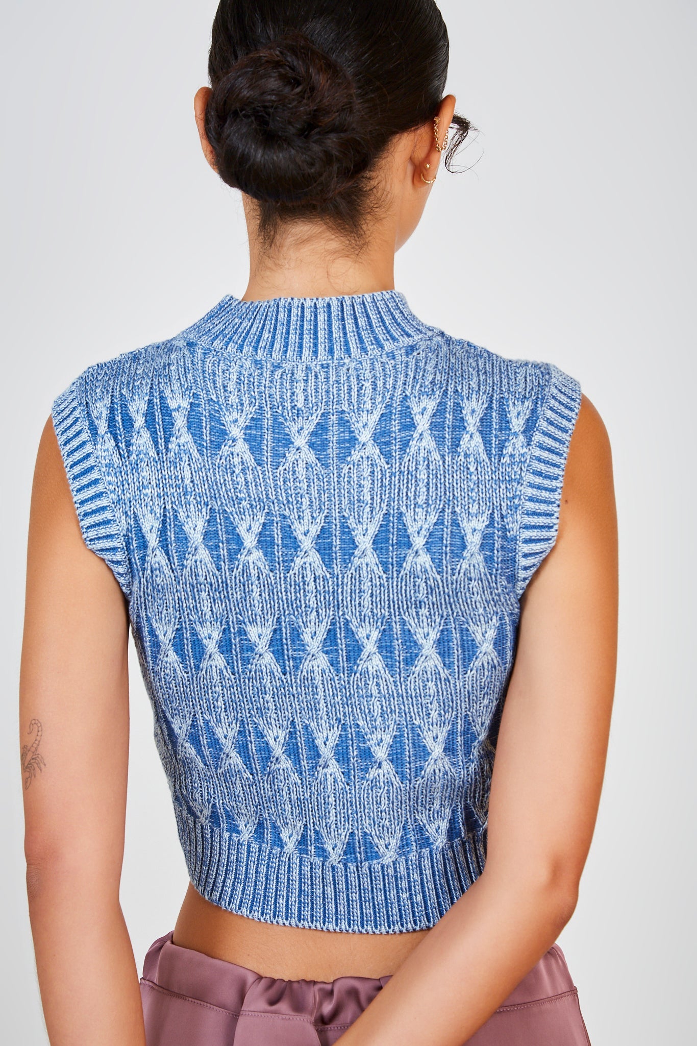 Light blue intarsia diamond weave sweater vest