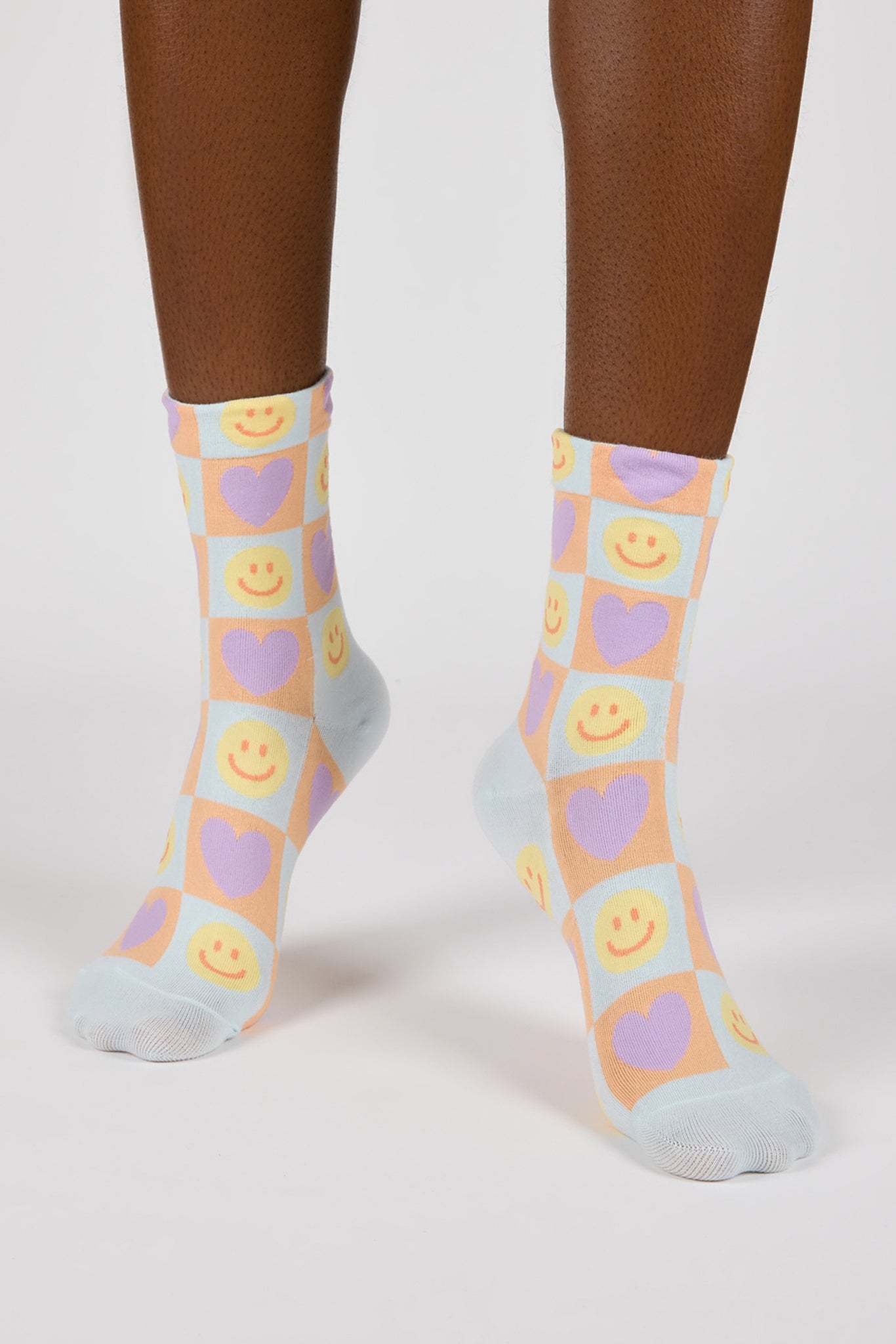 Mint green and peach smiley face heart block socks_2