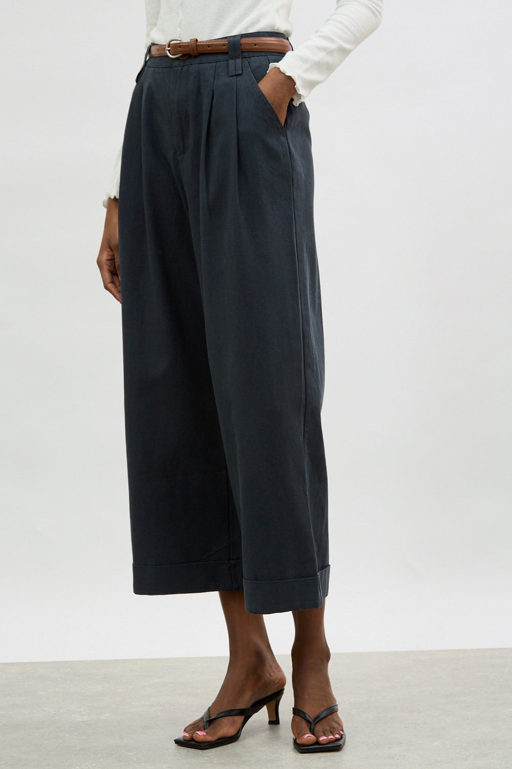 Navy blue pleated brown belted trousers_1
