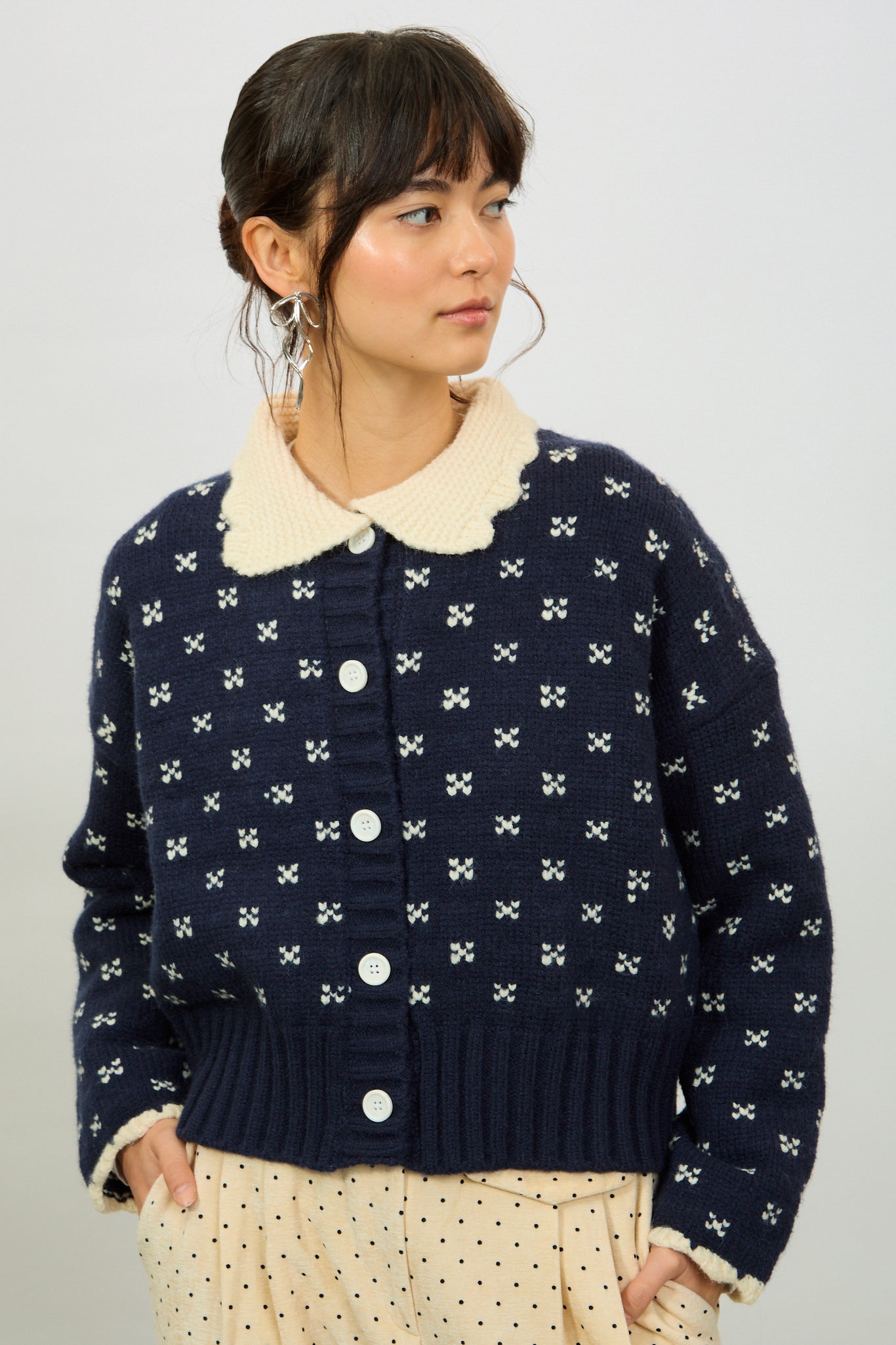 Navy scalloped collar intarsia cross cardigan_1