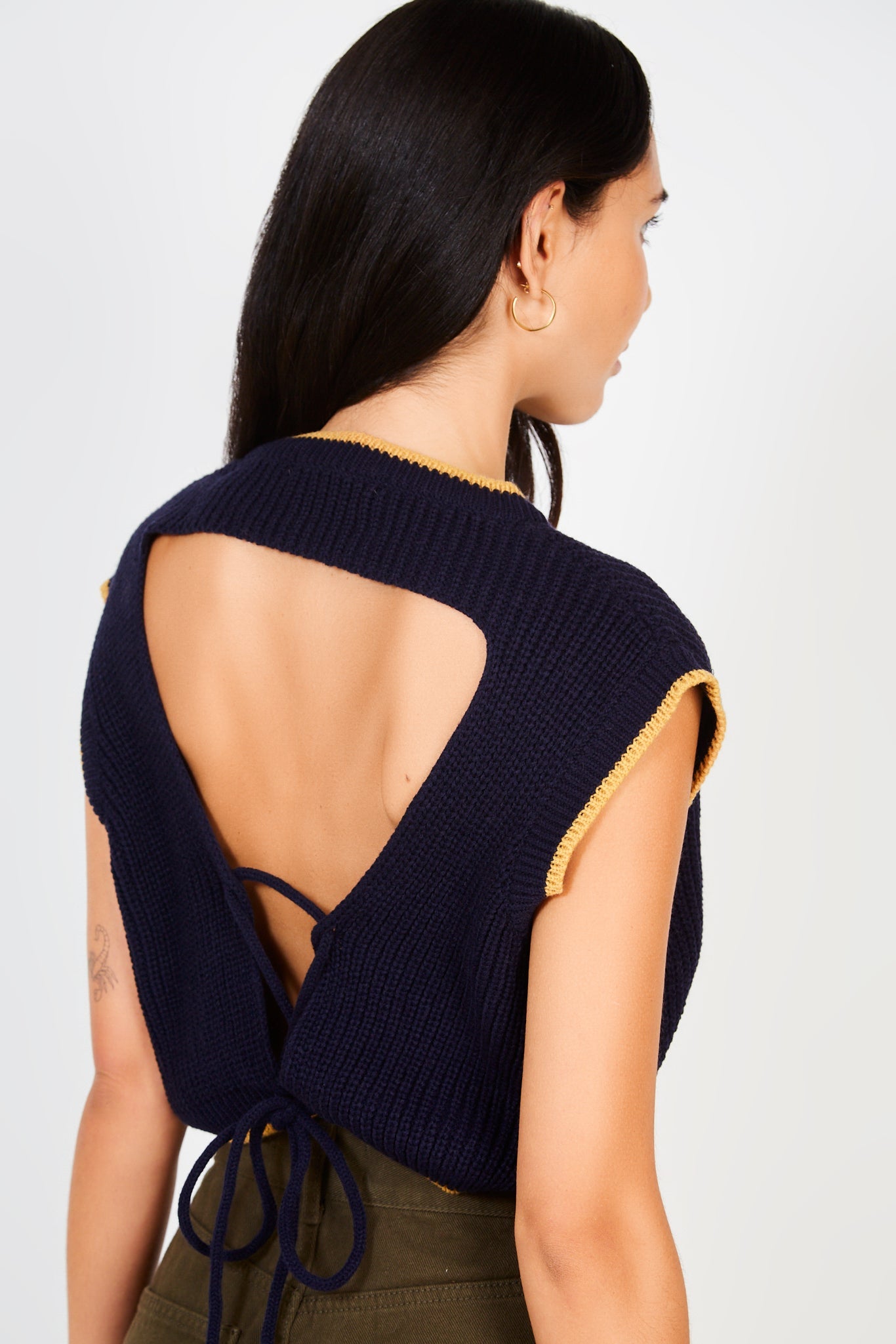 Navy and beige trim open tie back sweater vest_1